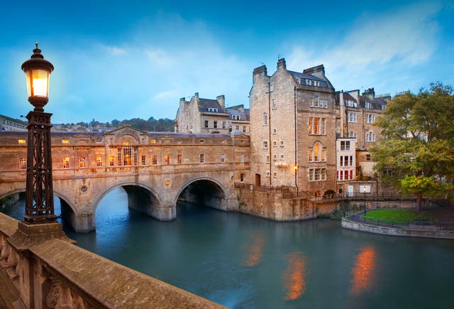 Pulteney Bridge by dusk, the main tourist attraction in Bath