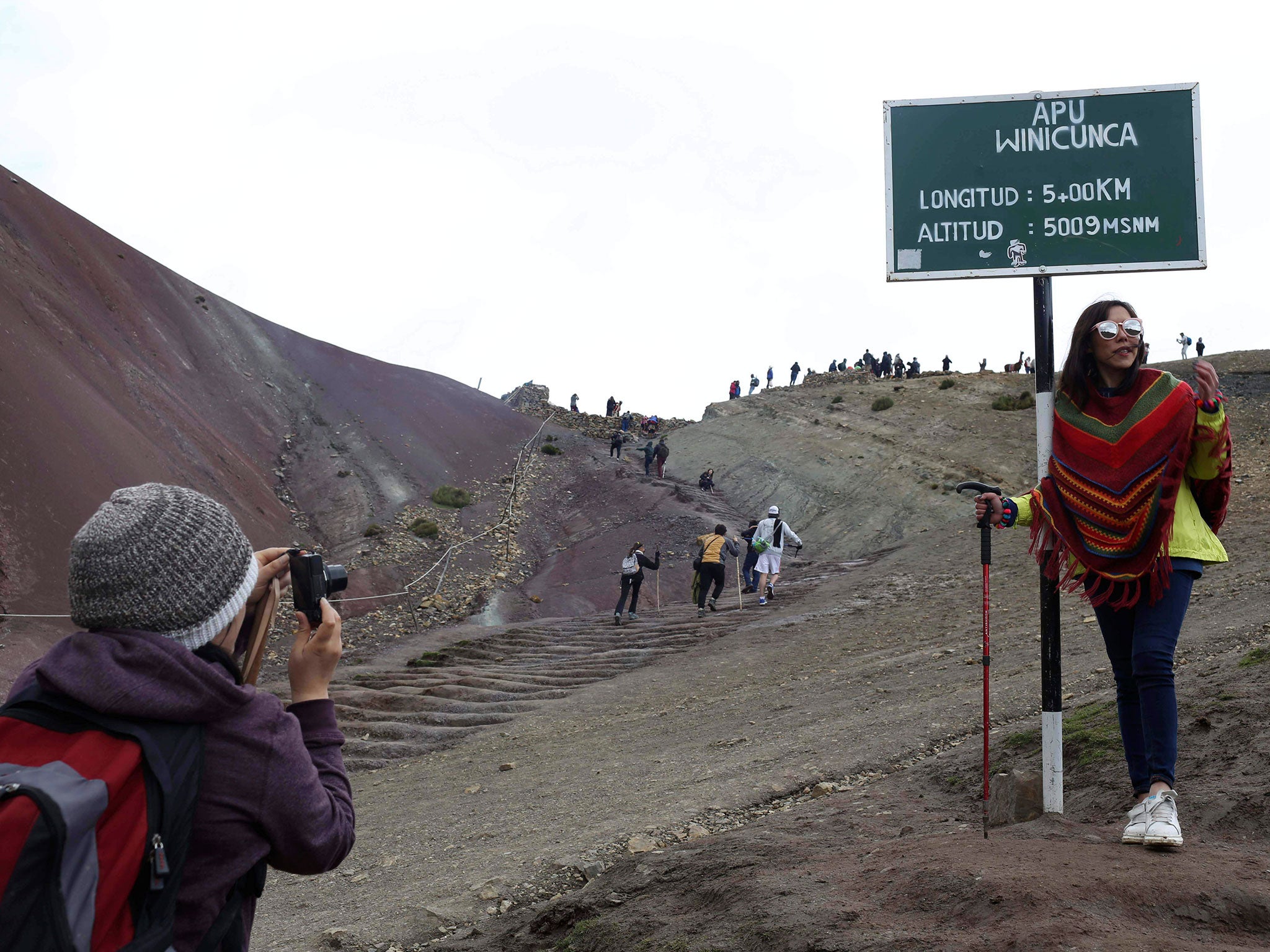 Tourists now flock to see the mountain