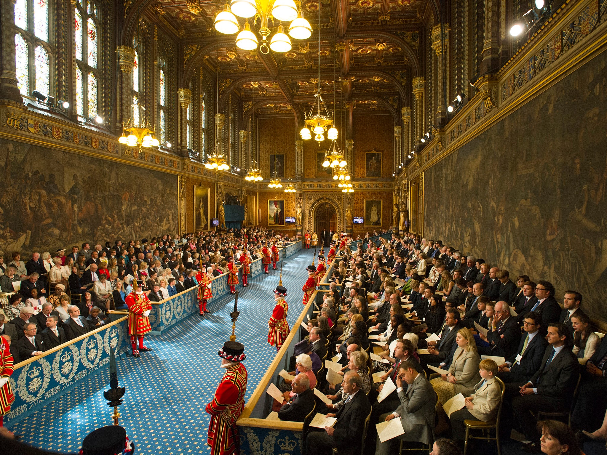 Peers taking their seats in the House of Lords for the state opening of Parliament