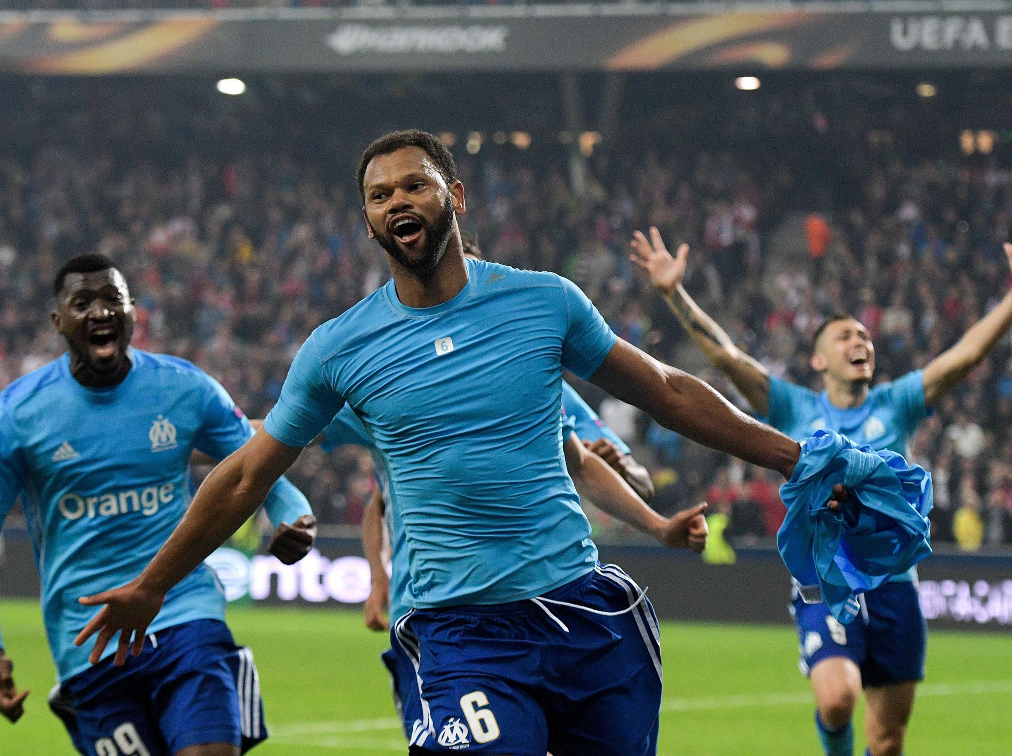 Rolando celebrates his winning strike in extra-time