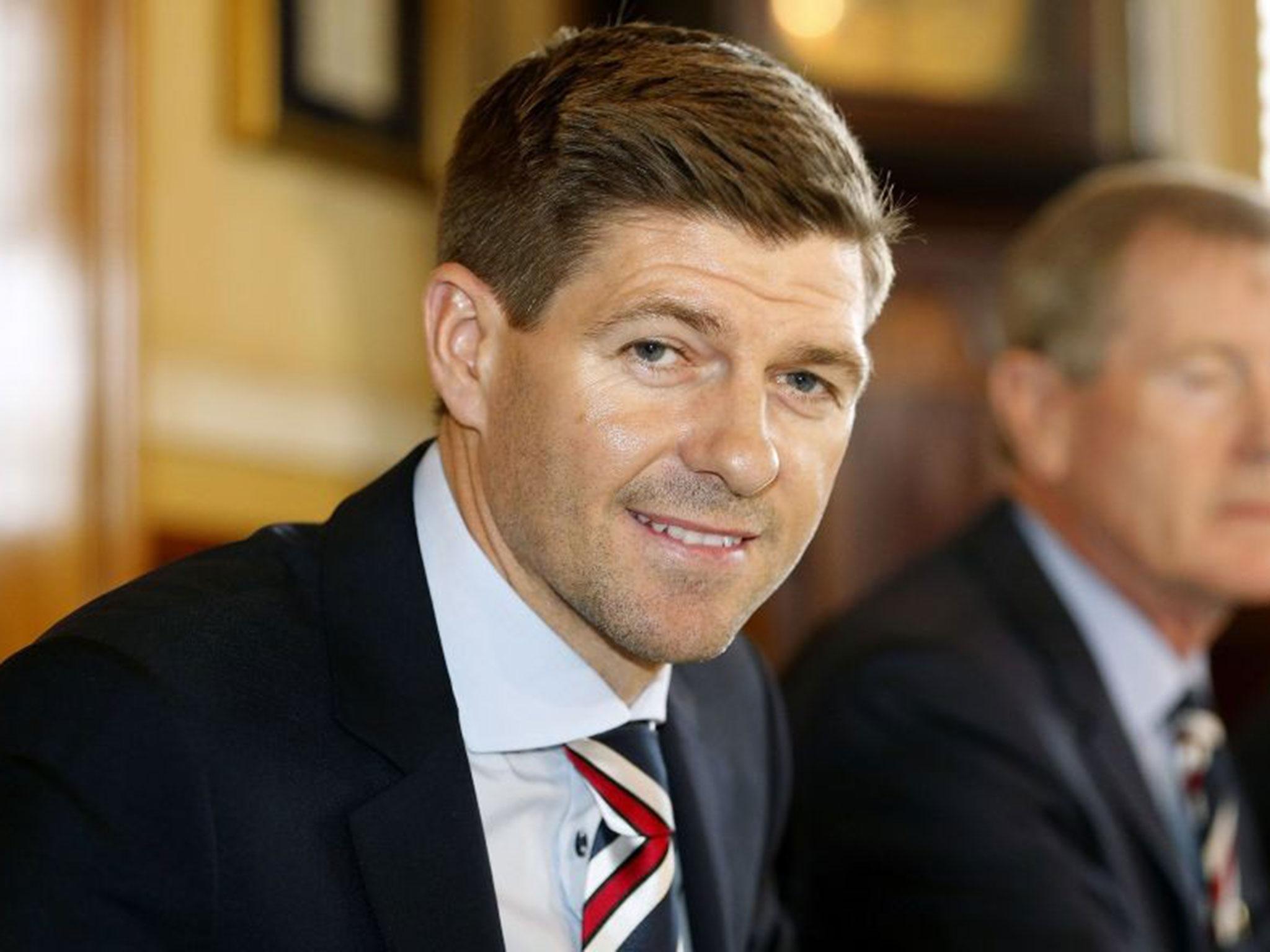 Steven Gerrard shakes hands with Rangers chairman Dave King