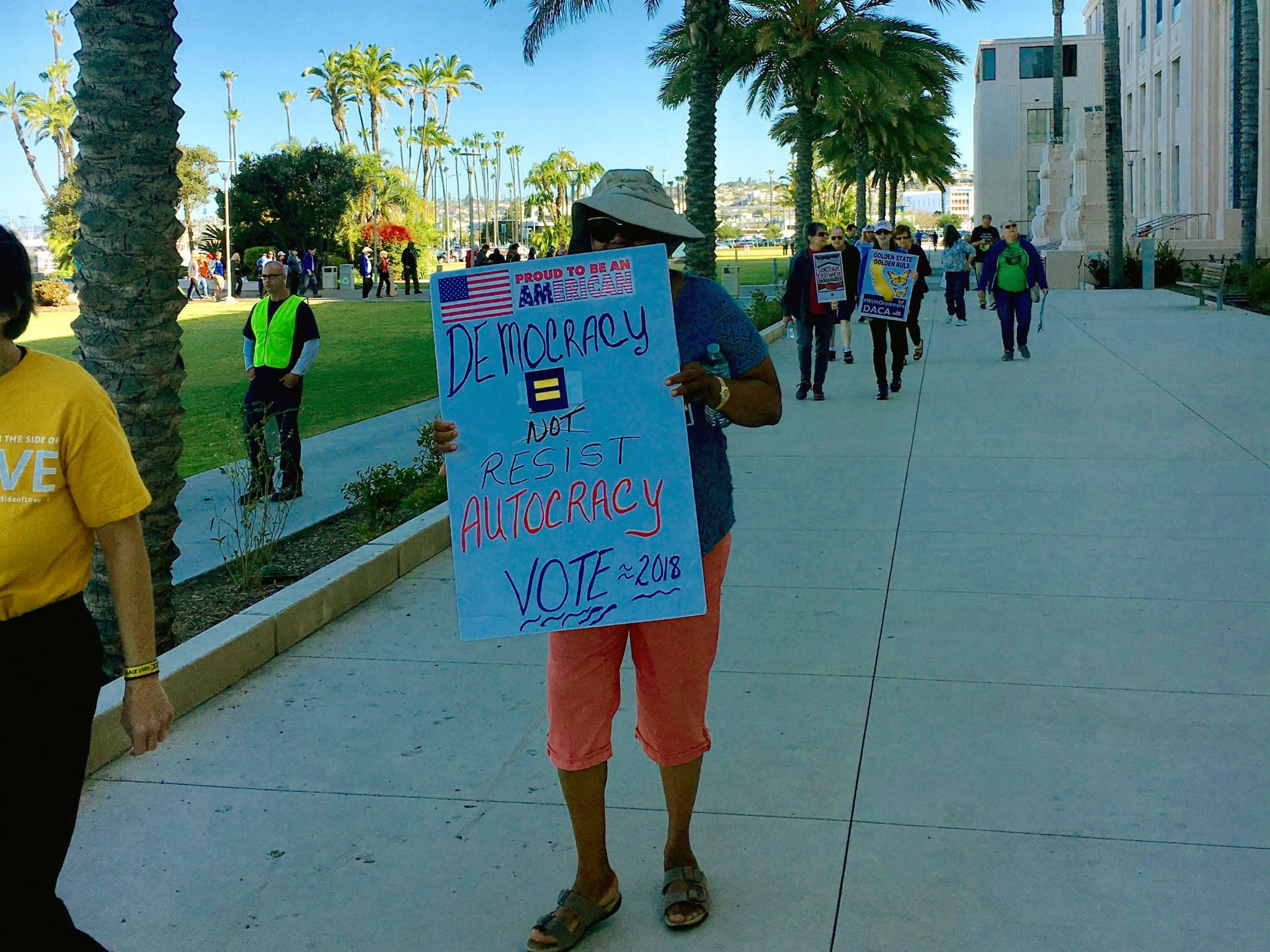 People protest outside the San Diego County Administration Center ahead of a meeting where the supervisors voted to support the Trump administration's lawsuit challenging California's so-called sanctuary statute