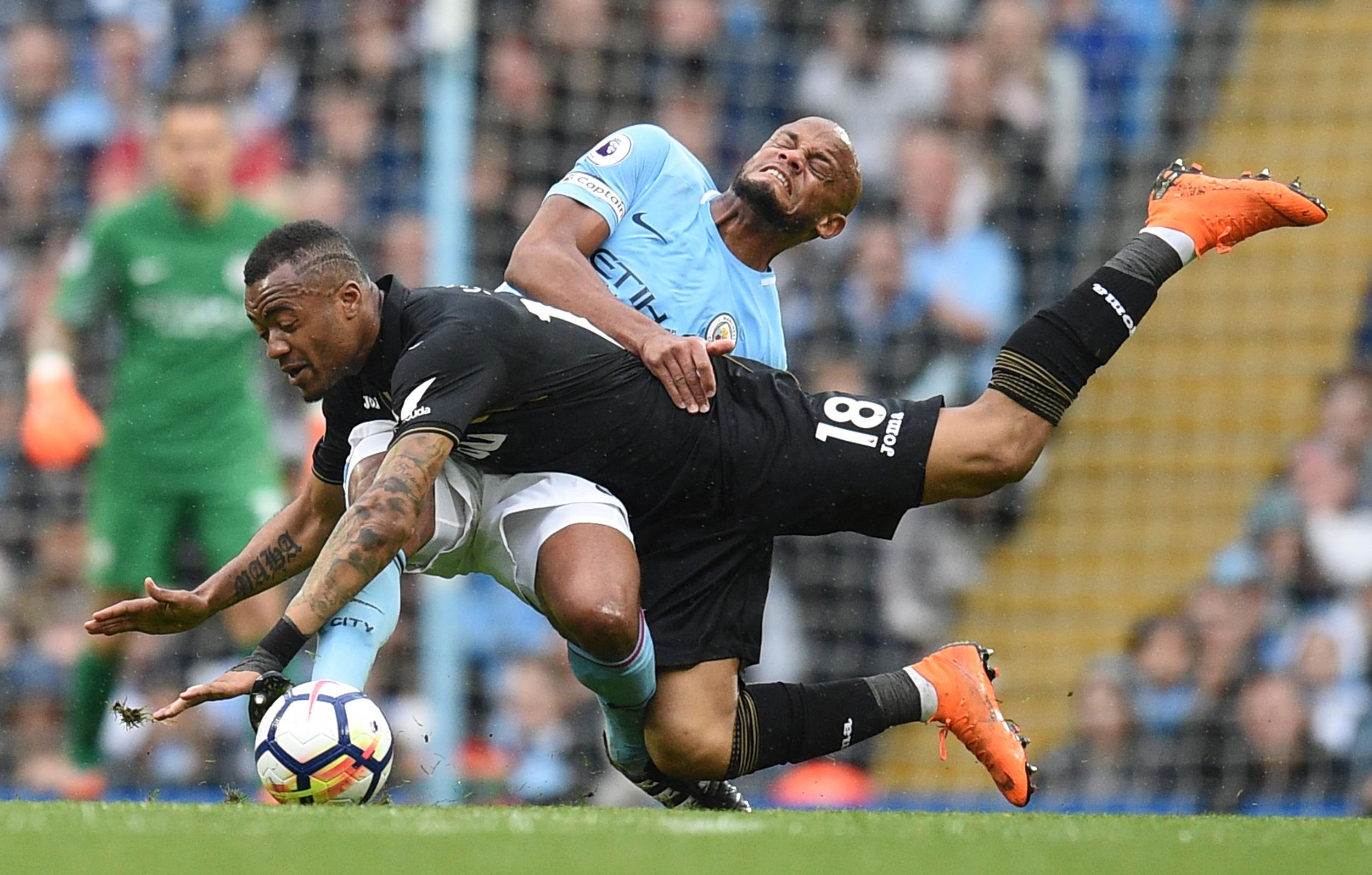 Vincent Kompany will lift the Premier League trophy on Sunday