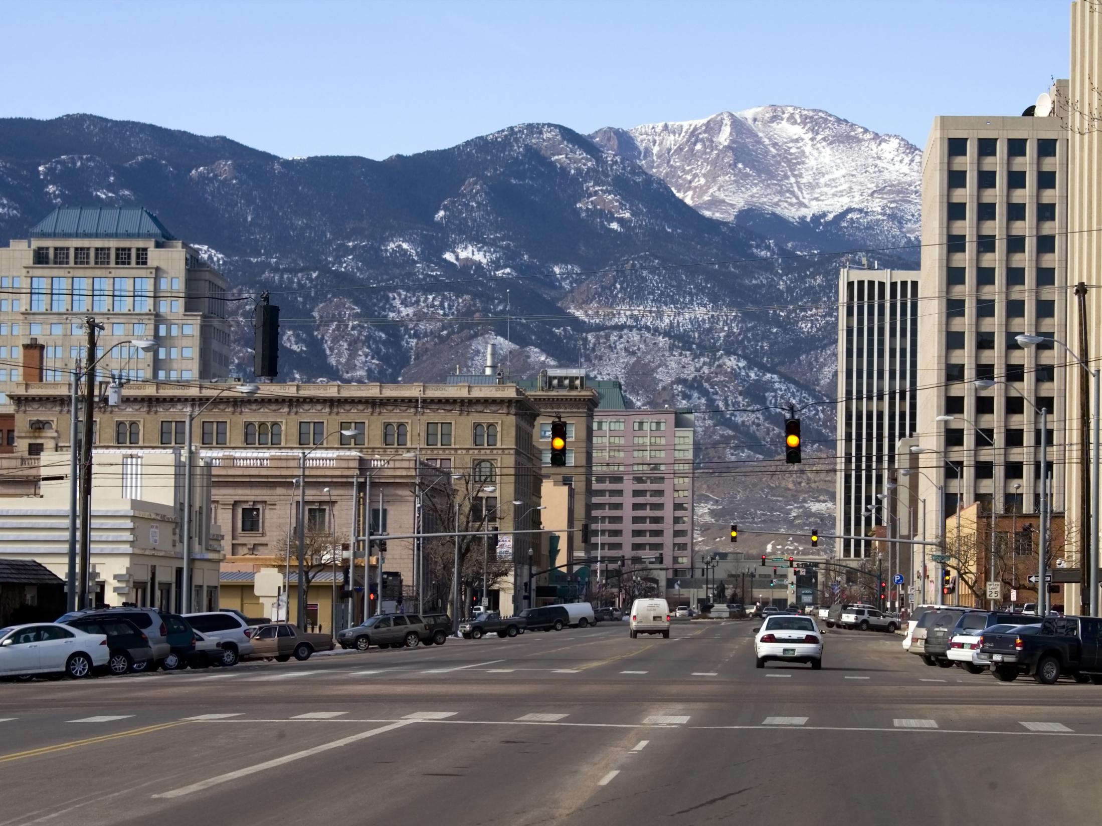 The metropolis is situated by the eastern foot of the Rocky Mountains (iStock/Getty)