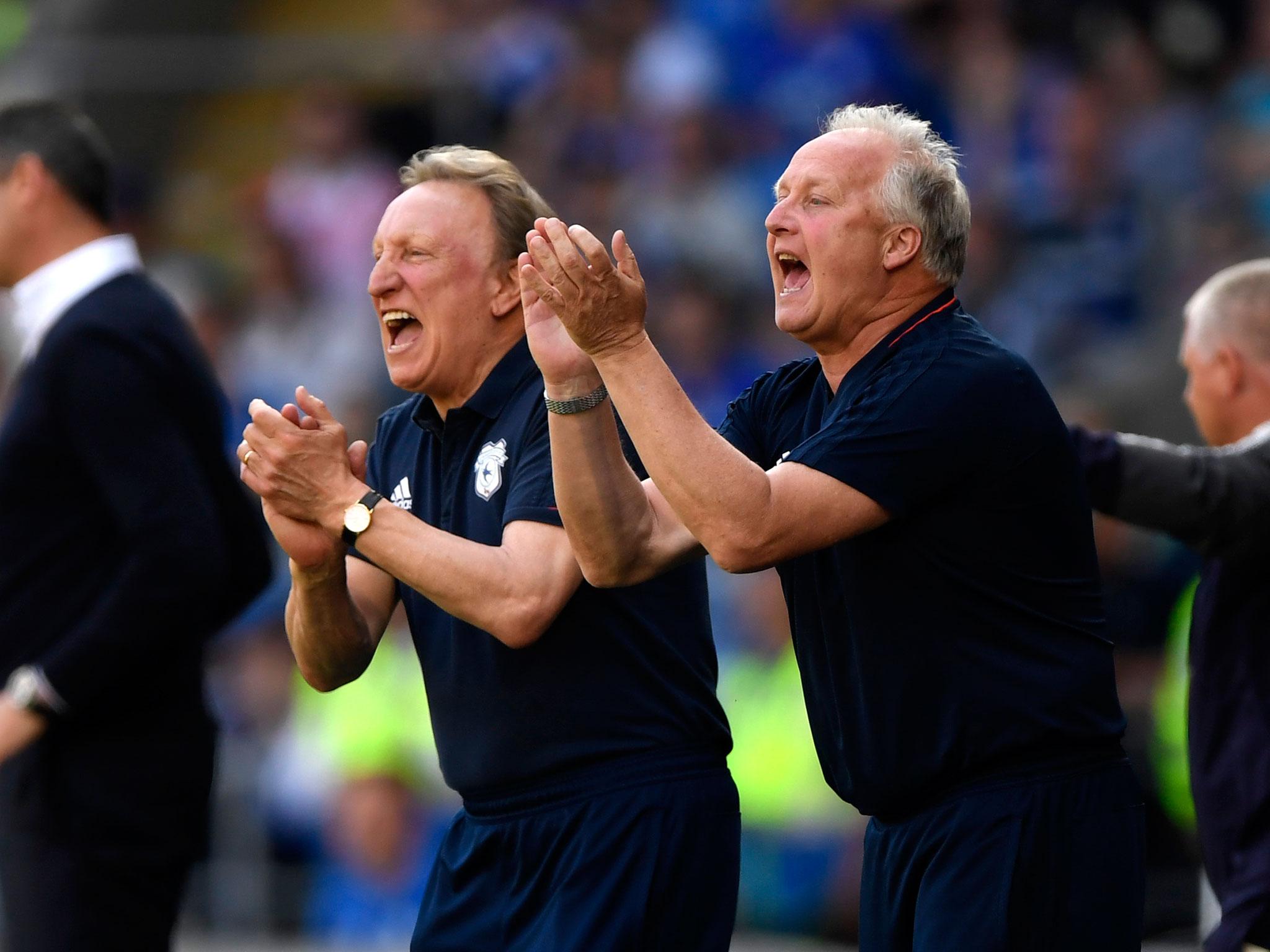 Warnock celebrates the eighth promotion of his managerial career