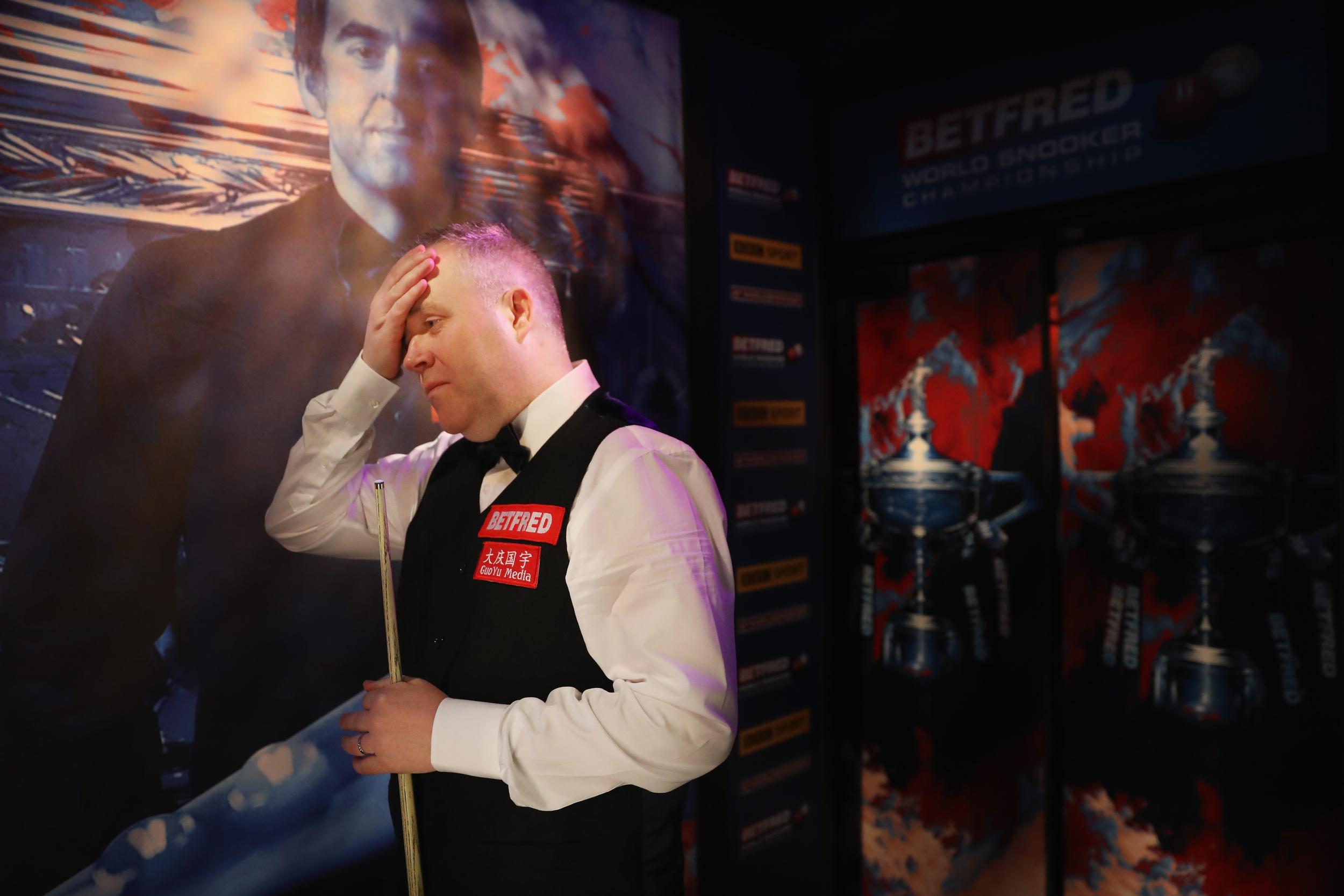 John Higgins lost the first four frames