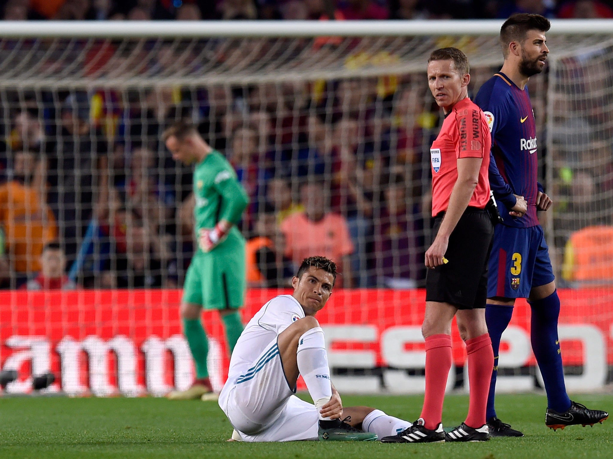 Cristiano Ronaldo will undergo tests on an ankle strain suffered in Real Madrid's 2-2 draw with Barcelona