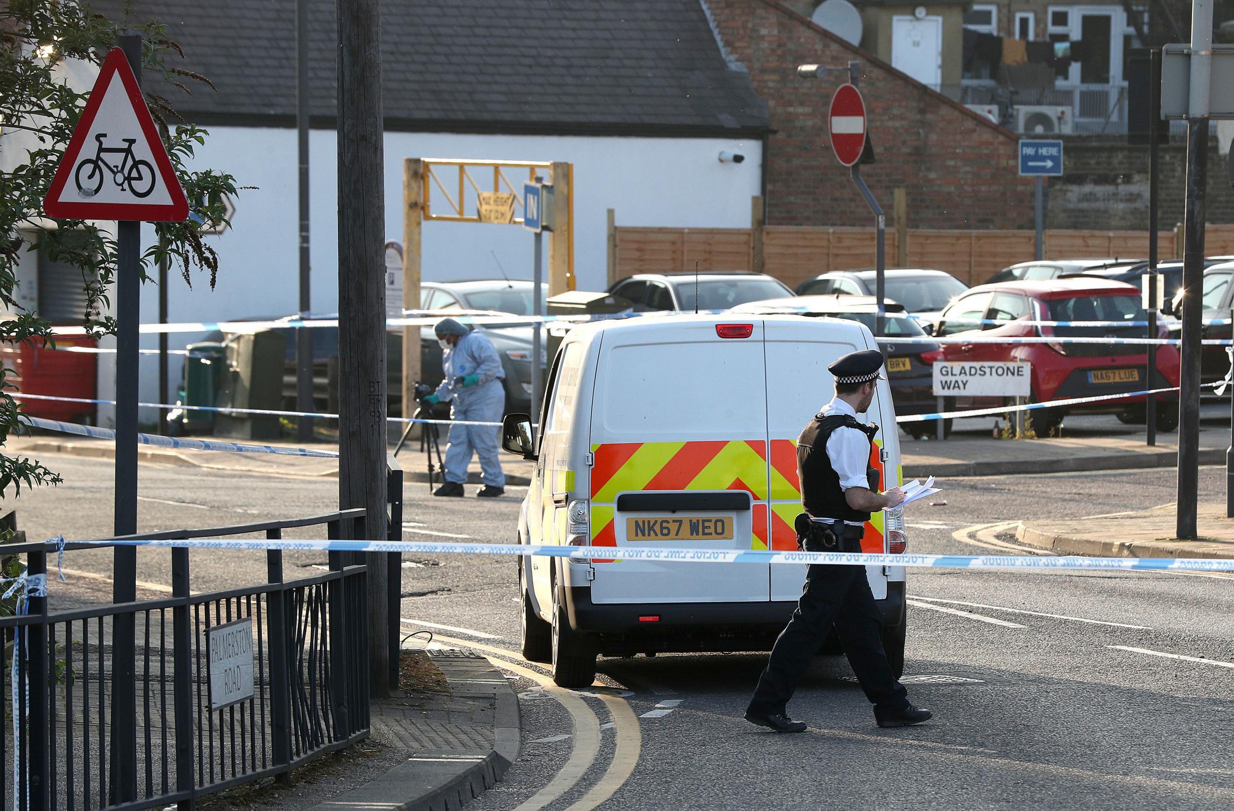 Police cordon off the scene of the shootings near Wealdstone's High Street