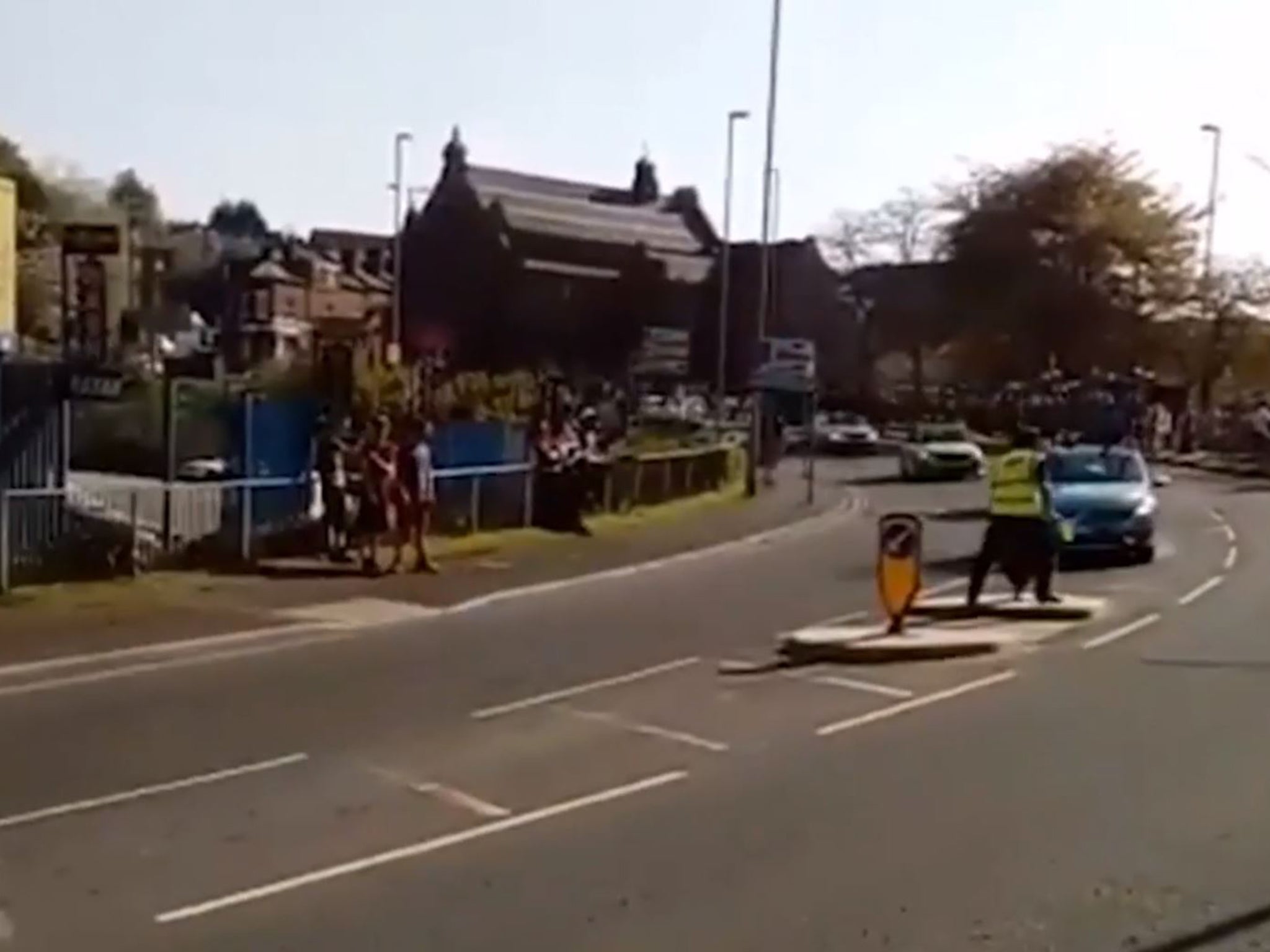 The Astana support car driver fails to notice Mr Sullivan and the traffic island (SWNS/Nathan Currie)