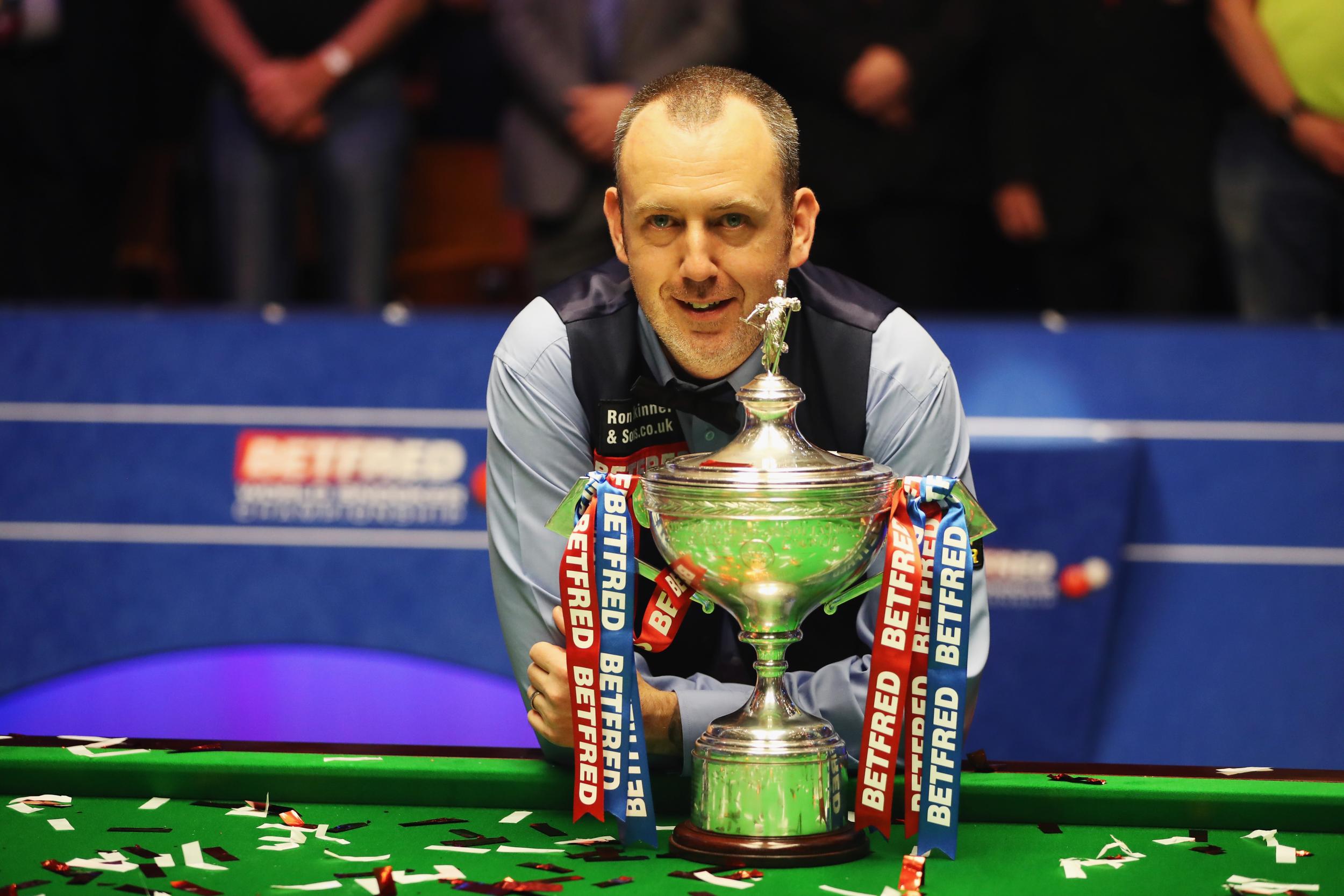 Mark Williams poses after clinching his third world title