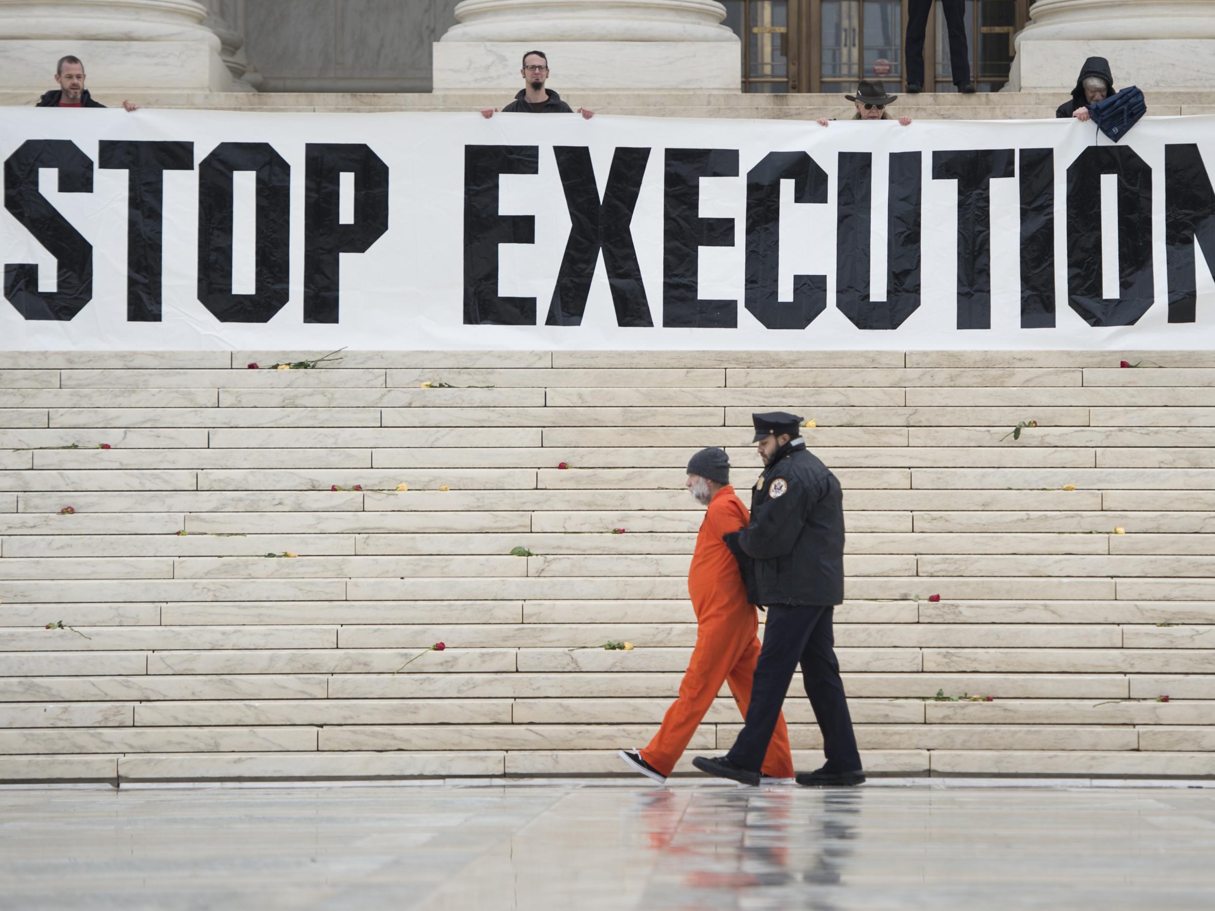 Randy Gardner wearing his executed brother's prison jumpsuit during an anti death penalty protest in Washington, 2017