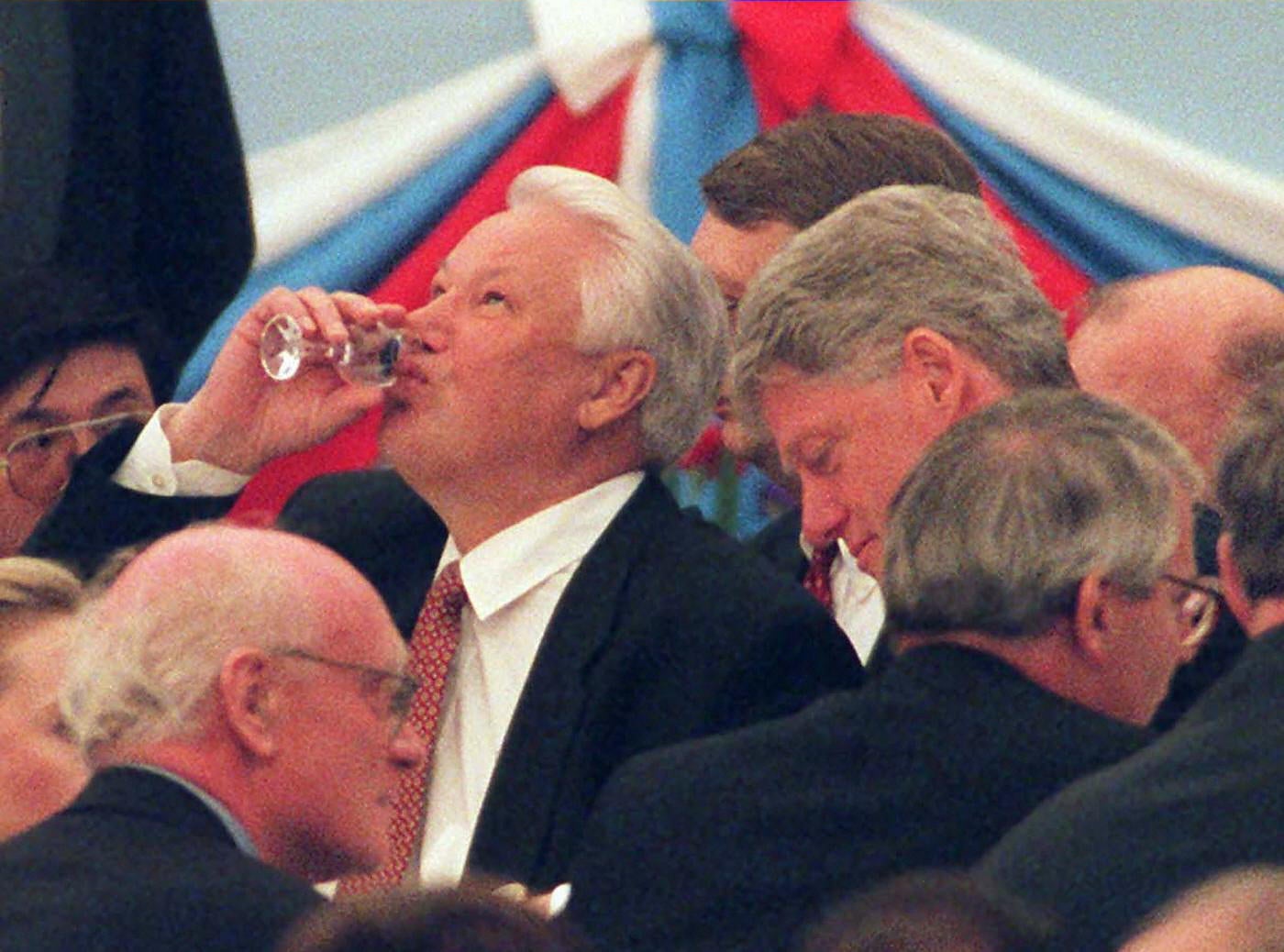 The Kremlin 1995: Boris Yeltsin knocks back a vodka with (right) Bill Clinton and John Major