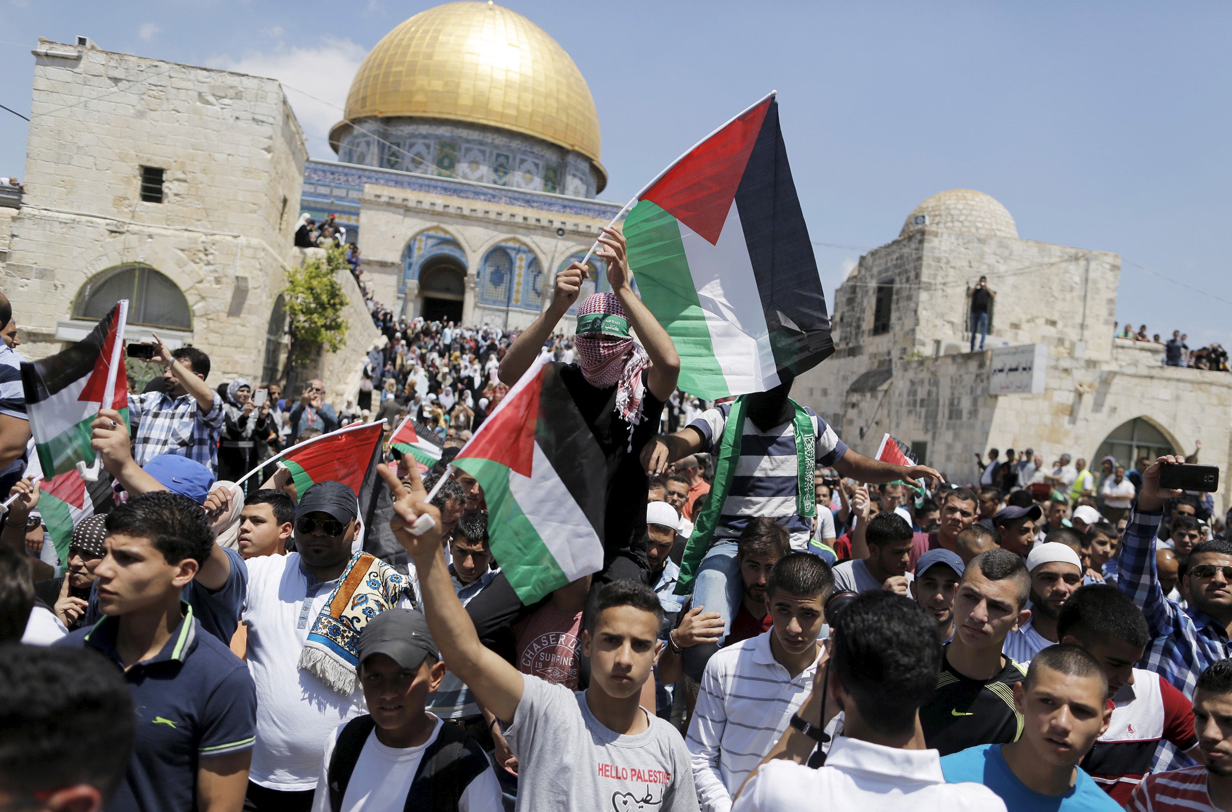 Palestinians during a protest to mark Nakba Day (15 May) near the Dome of the Rock in Jerusalem’s Old City in 2015