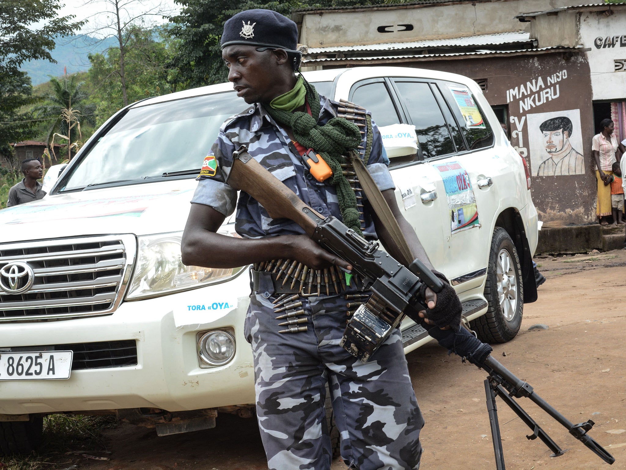 A security guard looks on during a protest against the referendum that could extent President Pierre Nkurunziza’s term in office