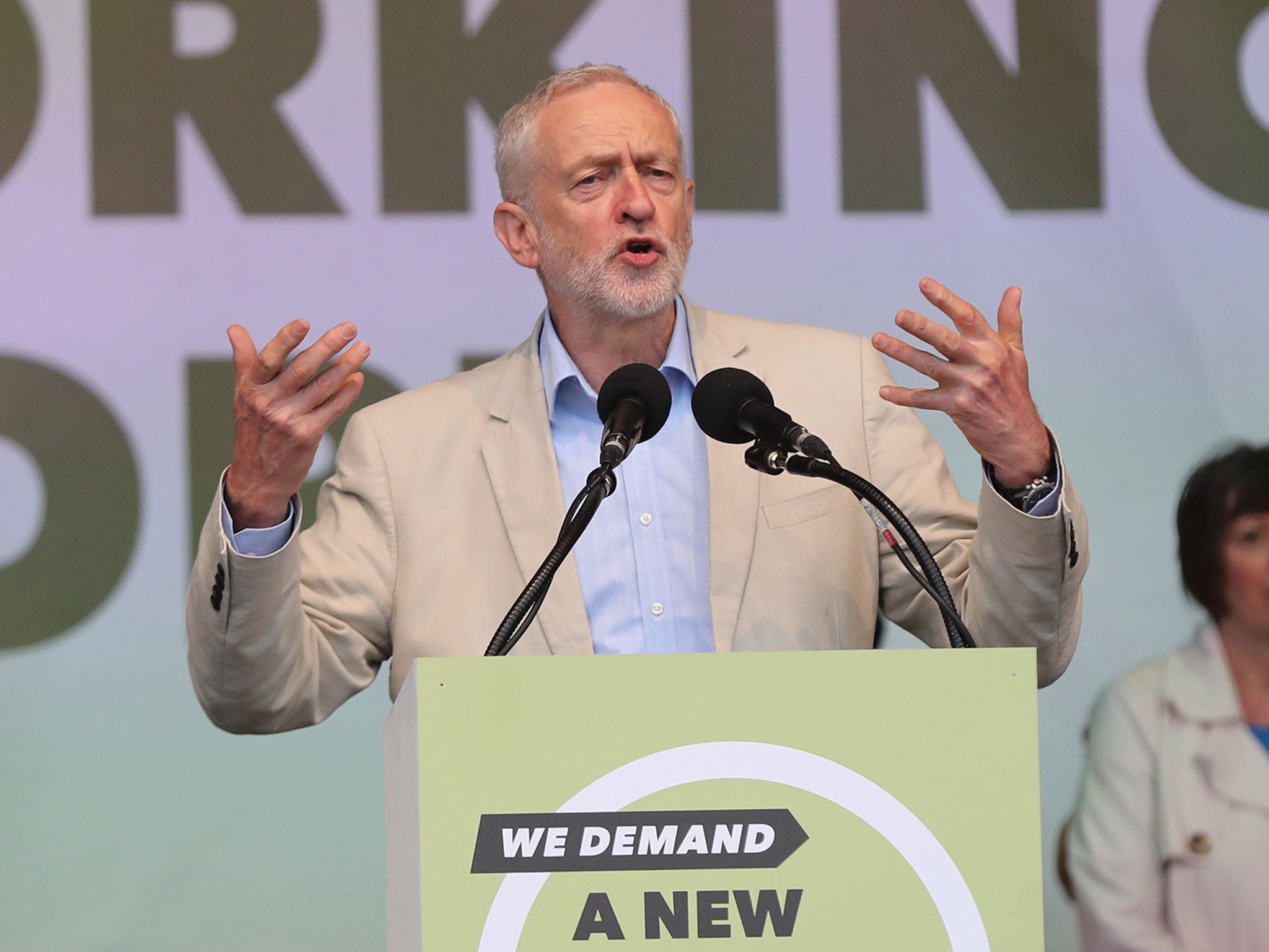 Labour leader Jeremy Corbyn speaks to demonstrators at the TUC rally