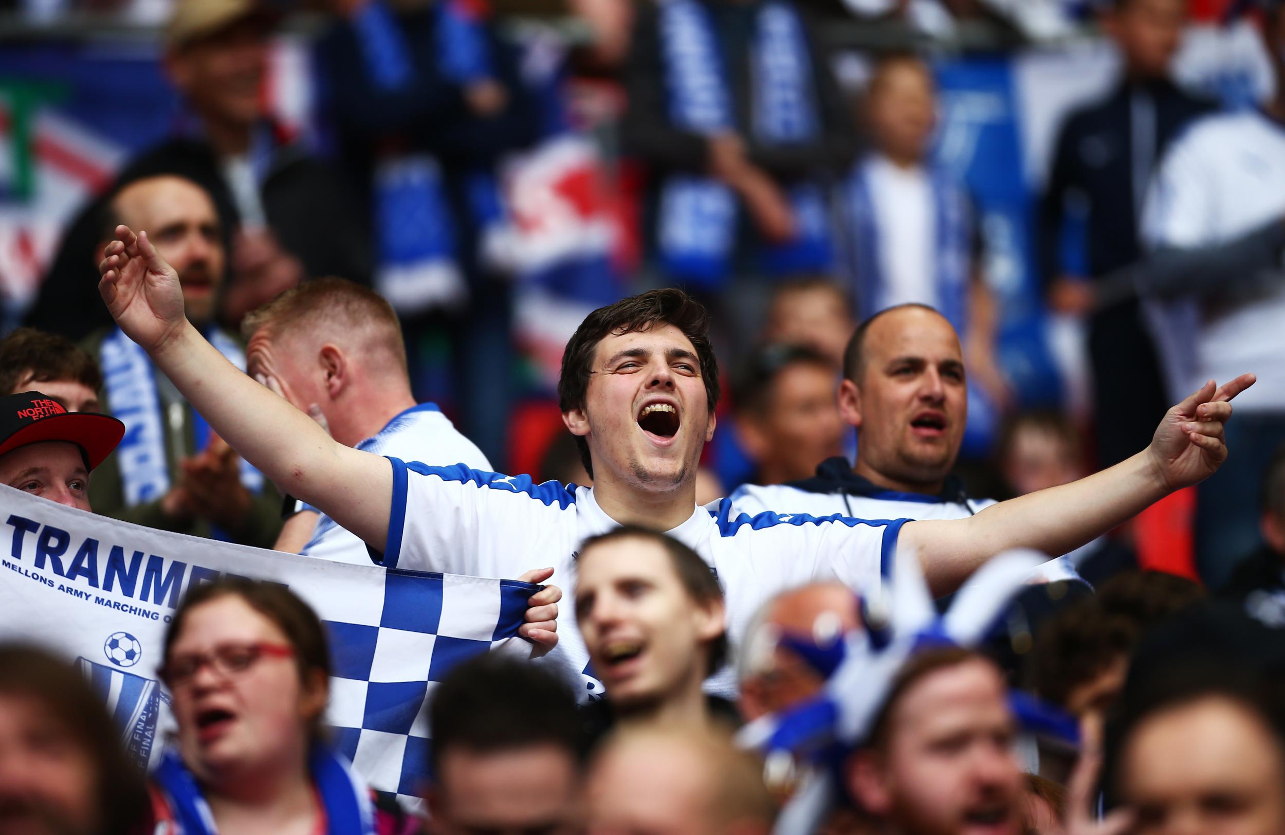 Fans celebrating at Wembley