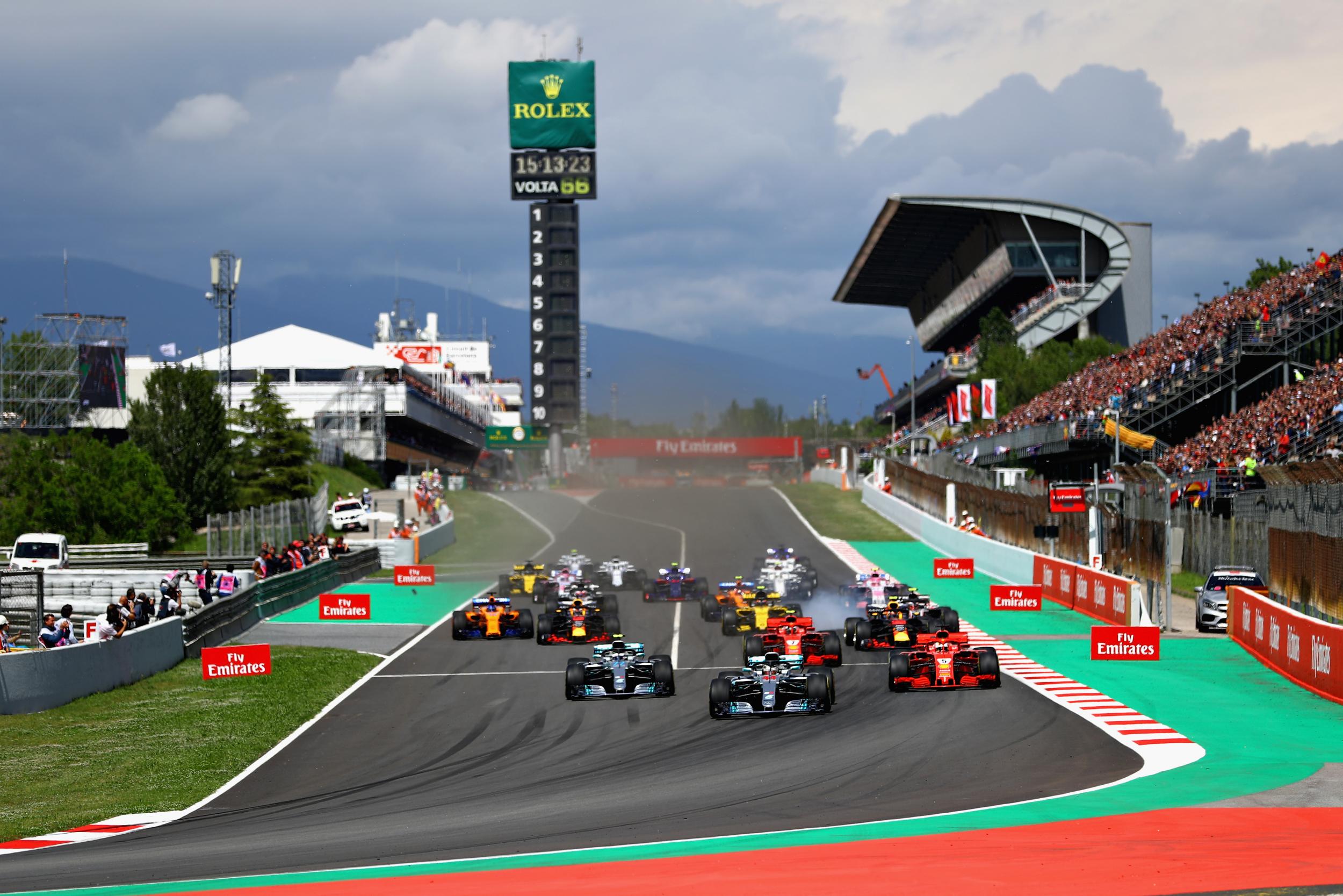 Lewis Hamilton leads the grid towards the first corner