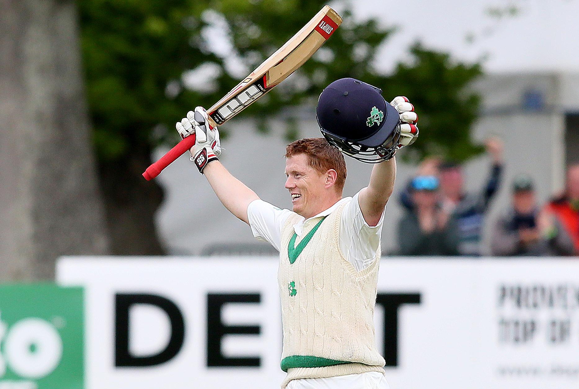 Kevin O'Brien celebrates his historic century