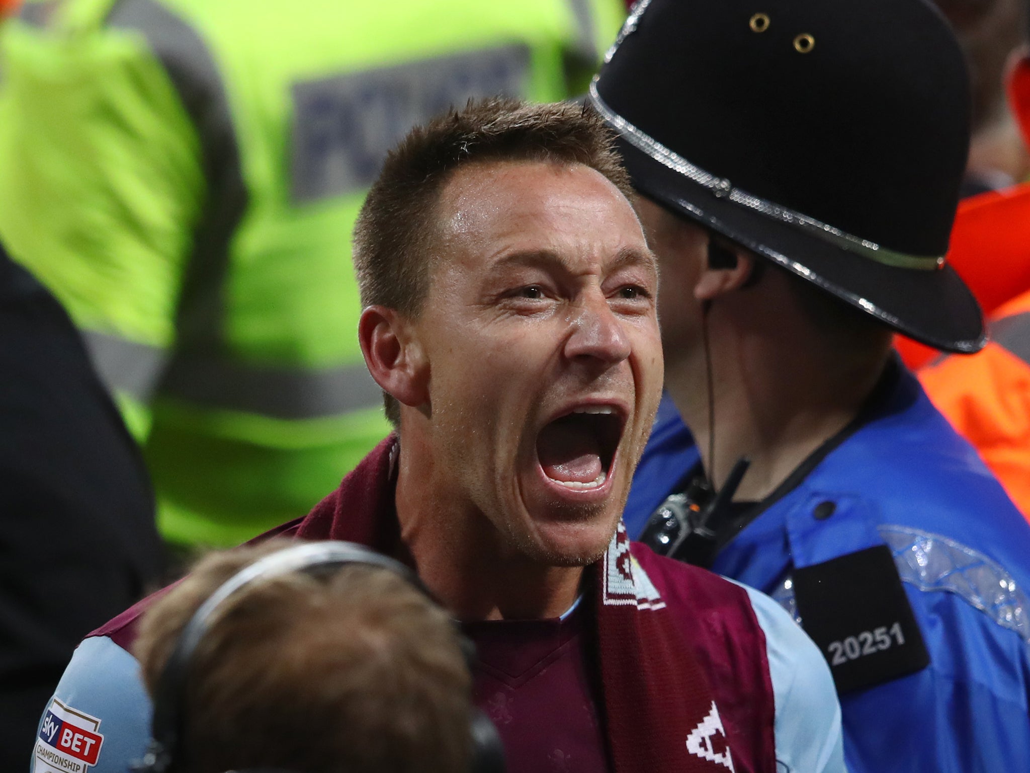 John Terry celebrates Aston Villa’s progression to the Championship play-off final