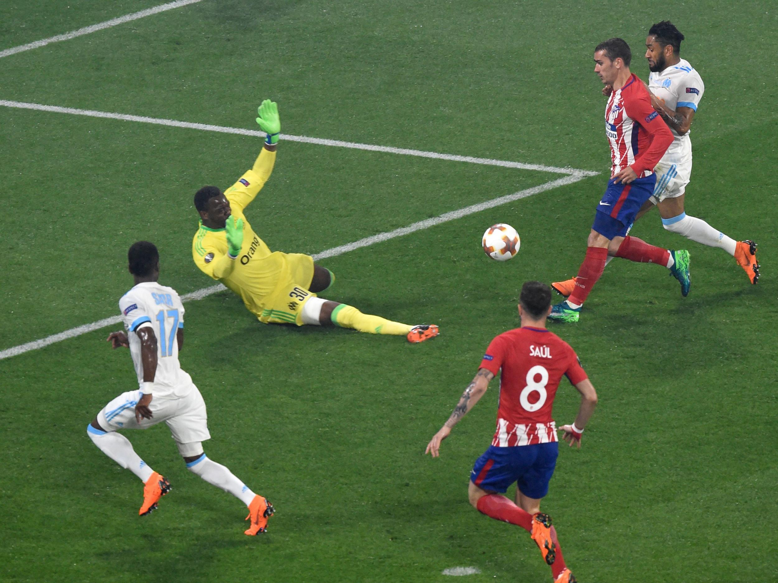 Griezmann chips in a clever finish for Atletico’s second