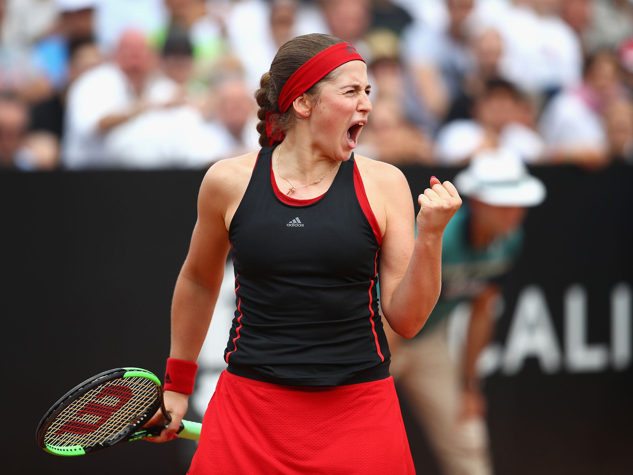 Ostapenko celebrates after securing victory