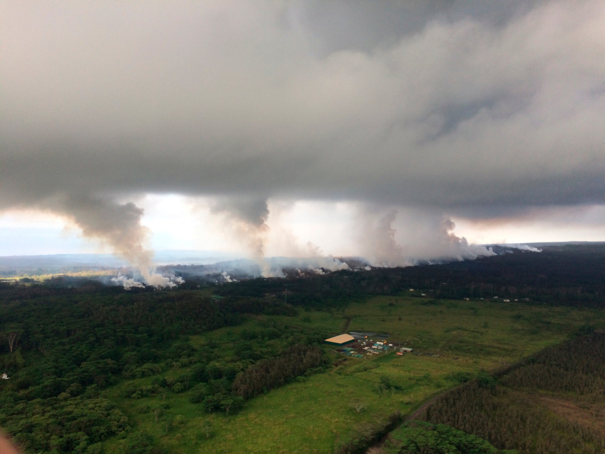 Sulphur dioxide plumes rise from fissures along the rift and accumulating in the cloud deck of the Kilauea volcano (US Geological Survey via AP)