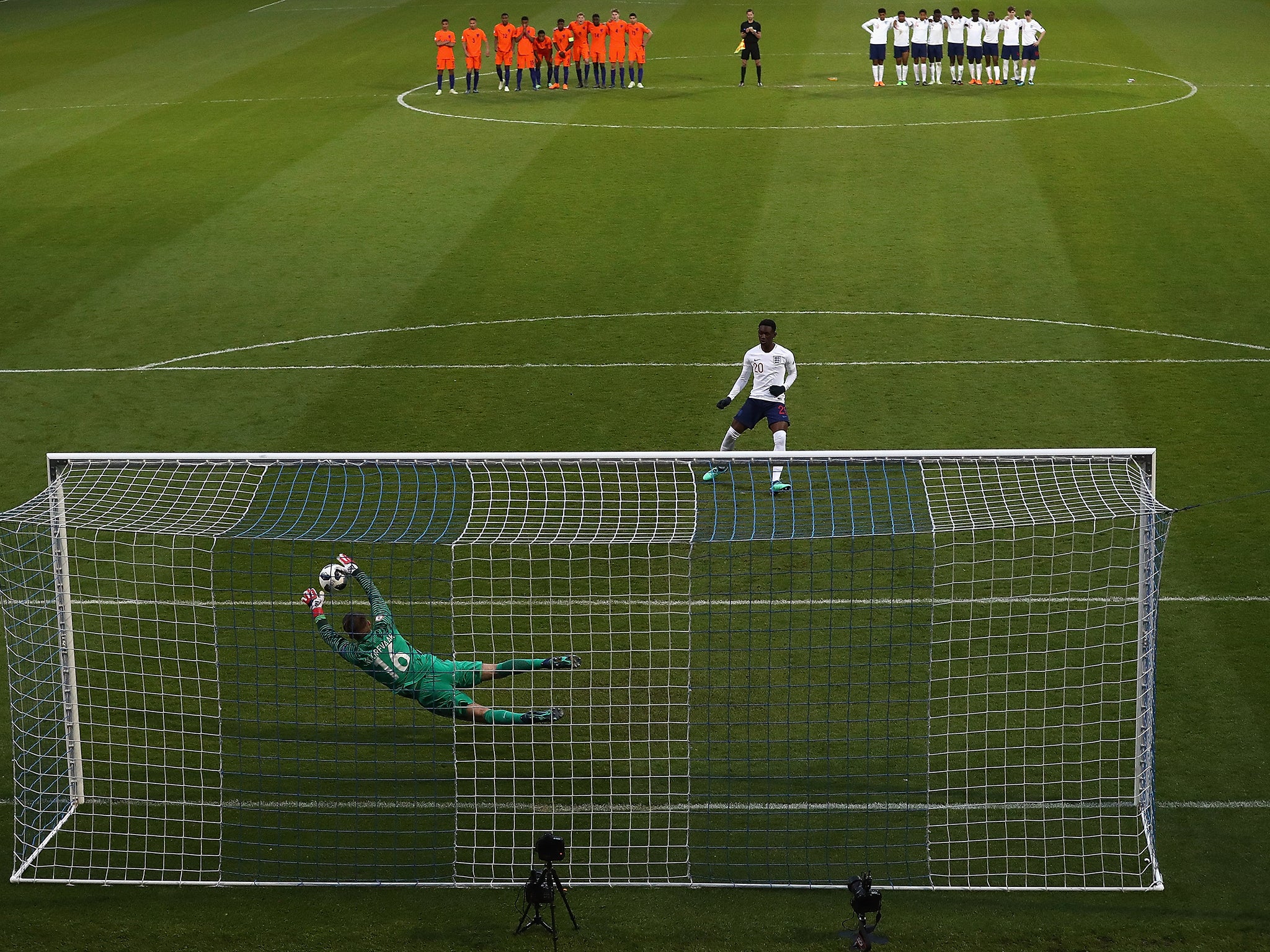 Joey Koorevaar saves the match-winning penalty from Folarin Balogun