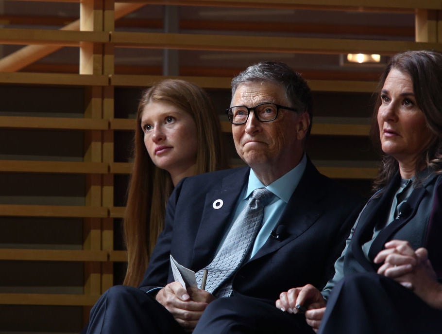 Jennifer Gates and her parents, Bill and Melinda Gates, listen to former US President Barack Obama in 2017