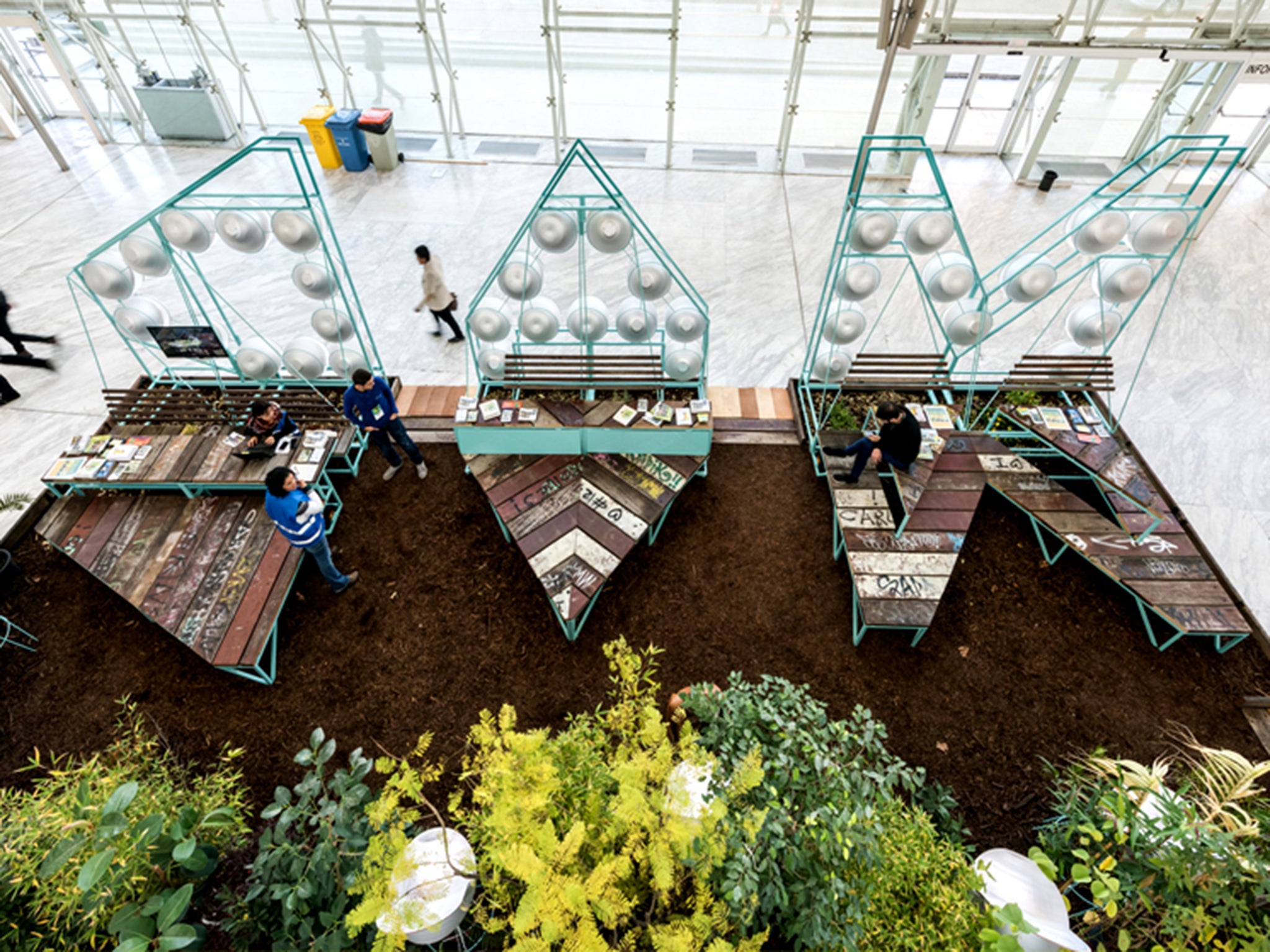 Zuloark's Madrid stand designed for the Conama Environment Fair 2016 featured reclaimed wood and potted plants