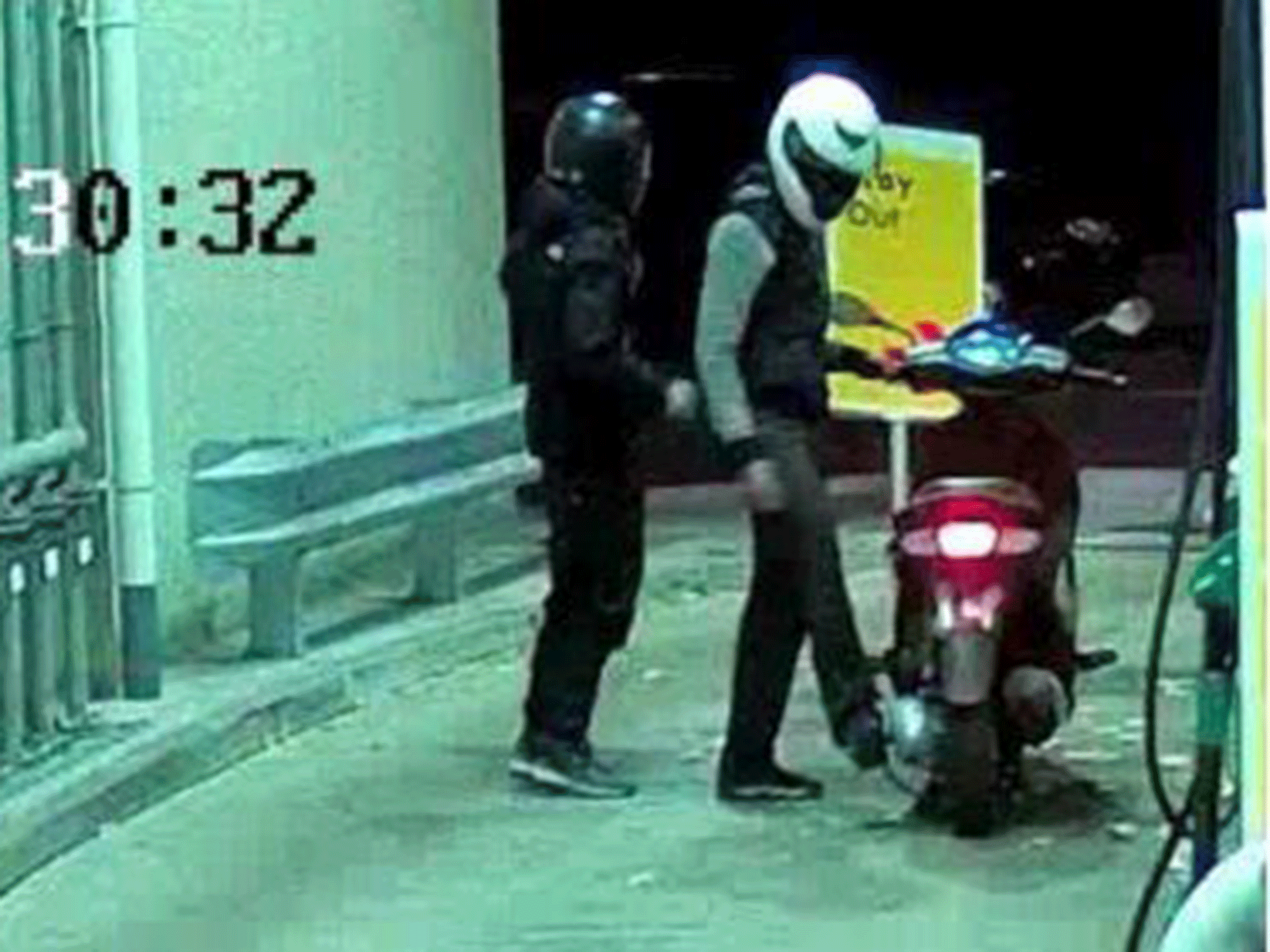 CCTV images capture Gilmaney and Thomas filling up their moped with petrol