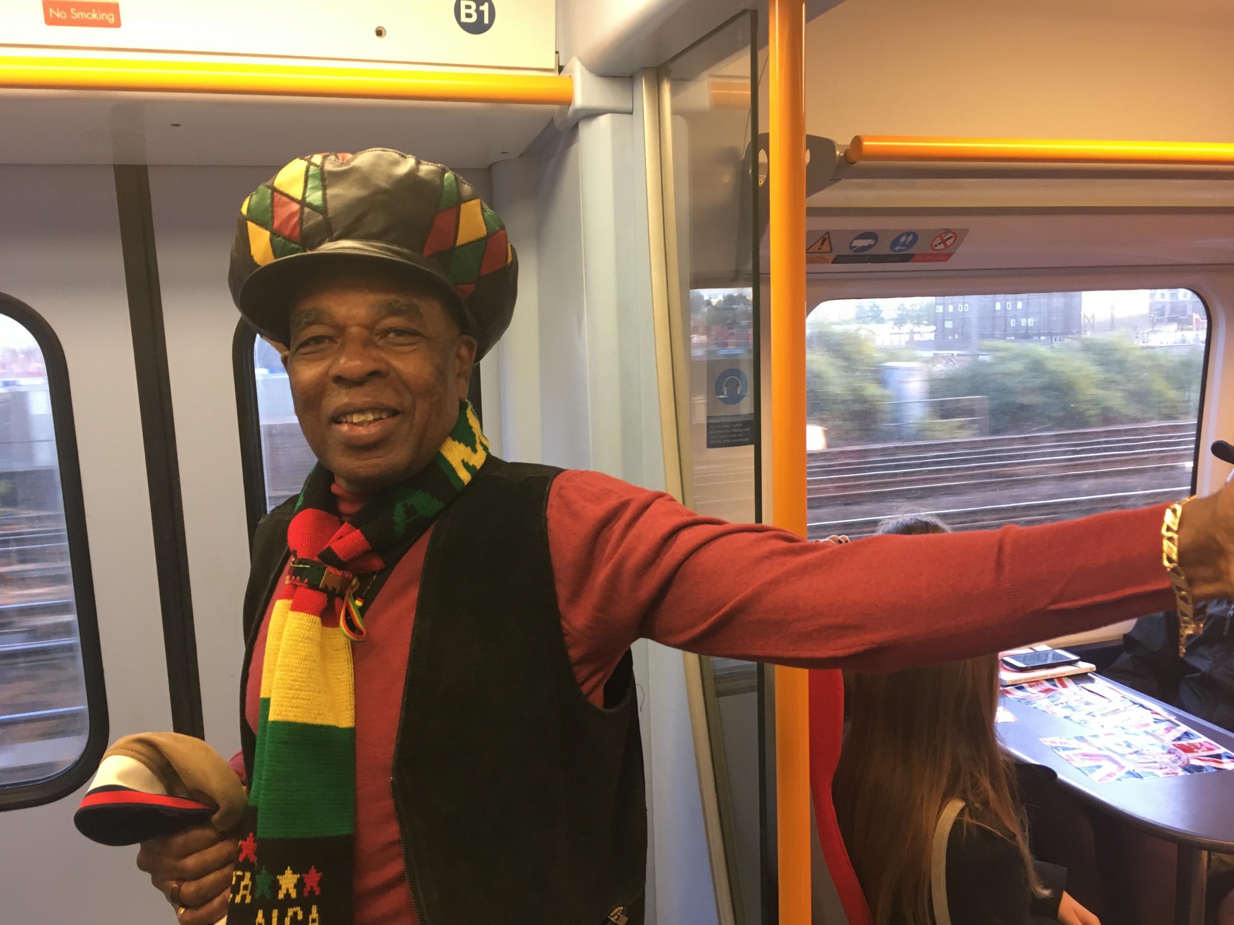 Early starter: Carlton Bernard, a Windsor-bound passenger aboard the first royal wedding special of the day