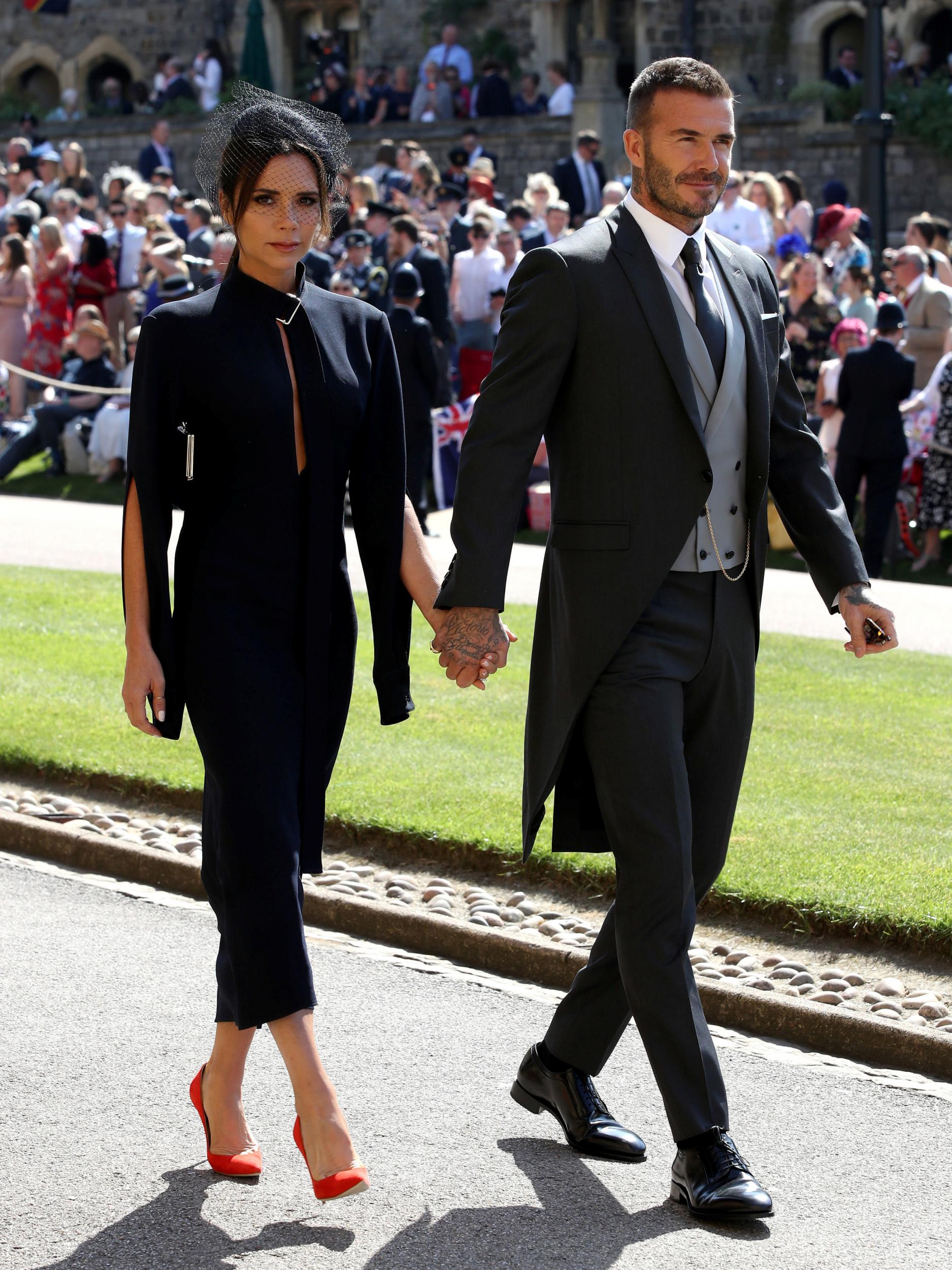 David and Victoria Beckham arrive at St George's Chapel at Windsor Castle