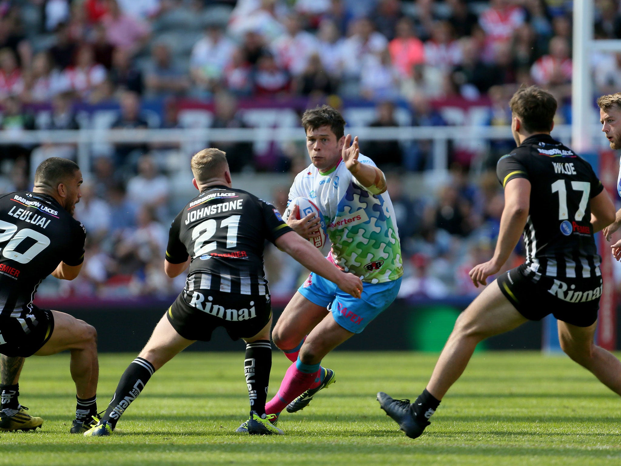 Louie McCarthy-Scarsbrook in action for St Helens