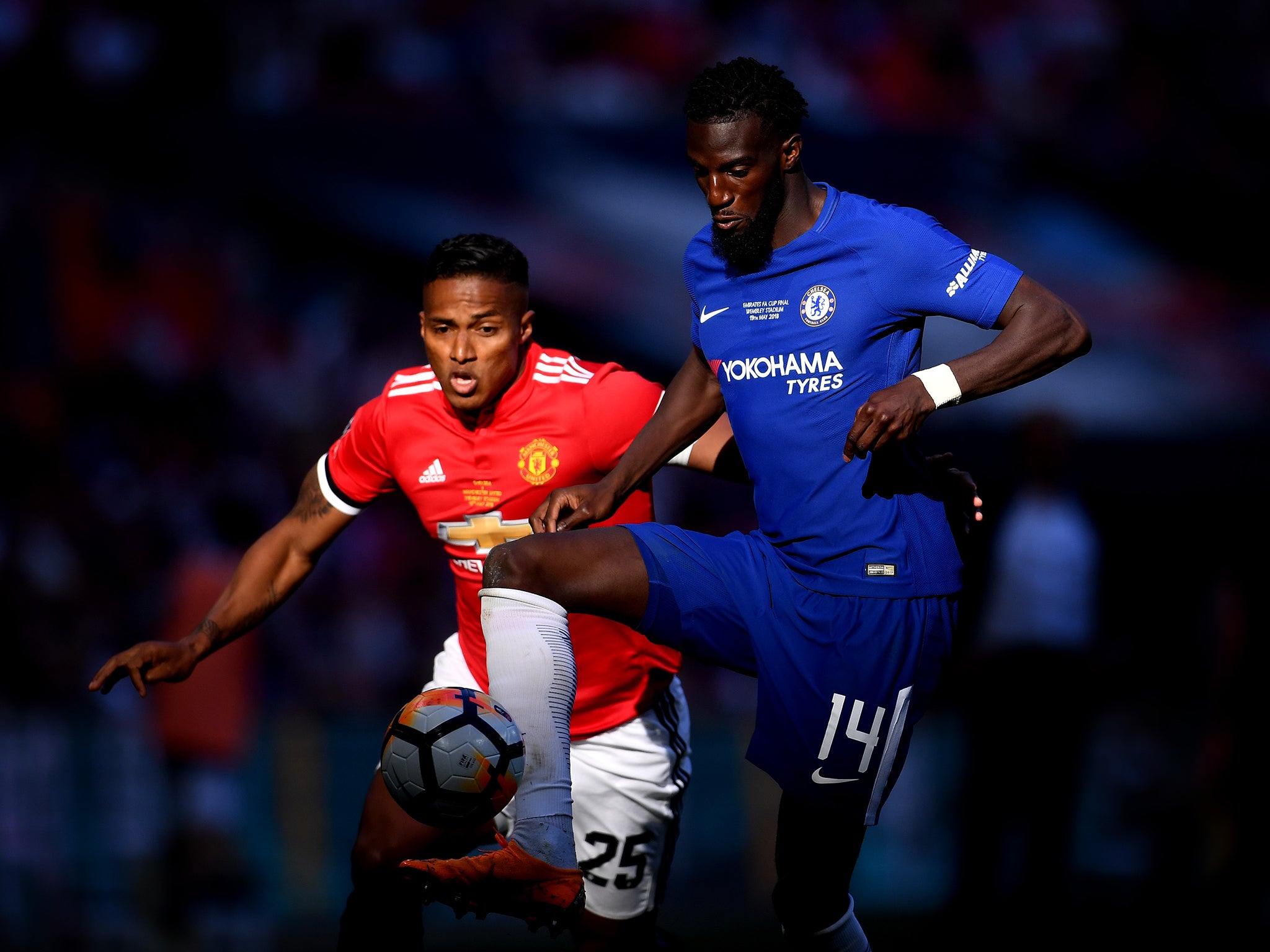 Tiemoue Bakayoko brings the ball under control as Antonio Valencia looks on (Getty )