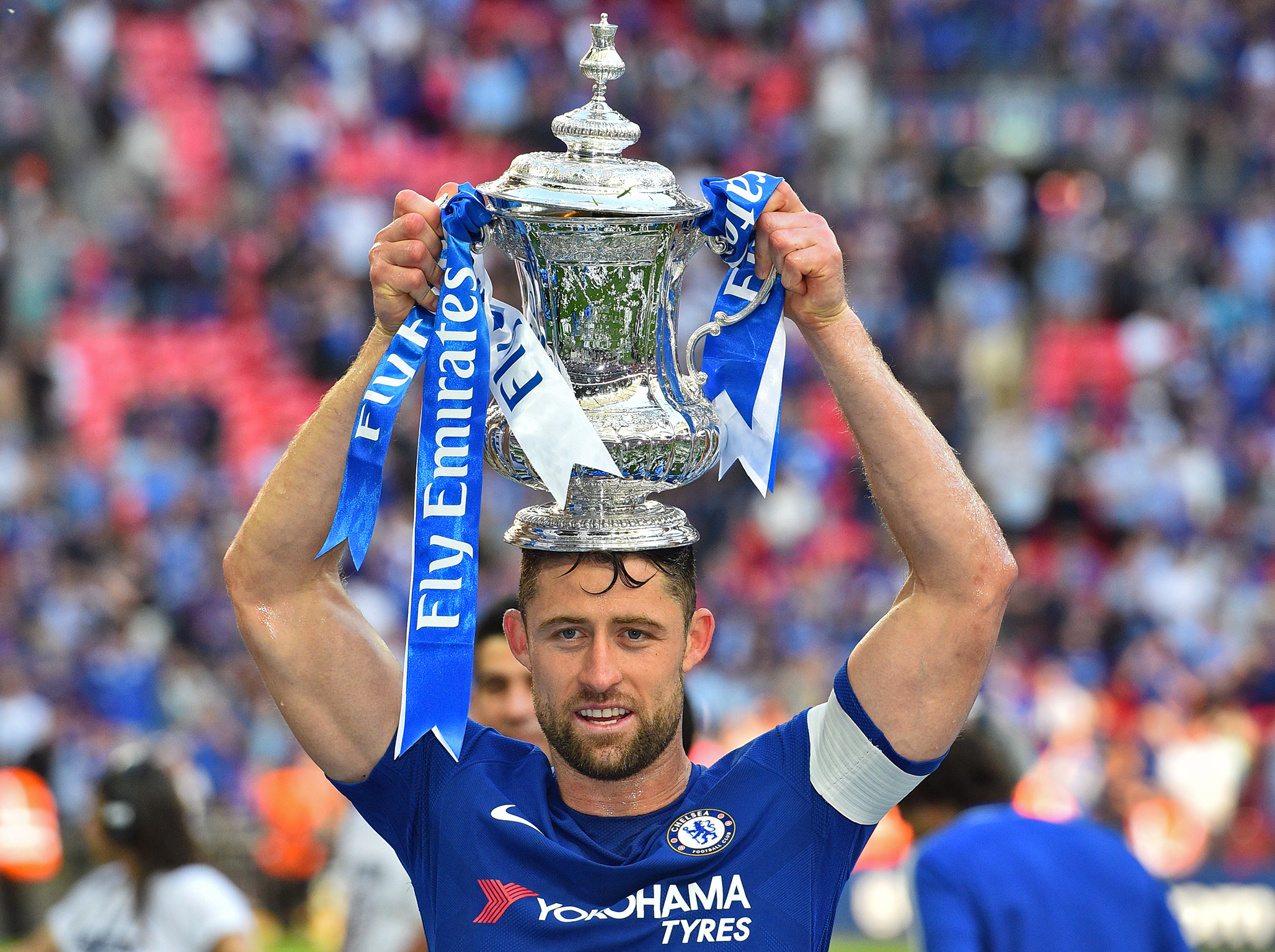 Gary Cahill celebrates winning the FA Cup last season (Getty)