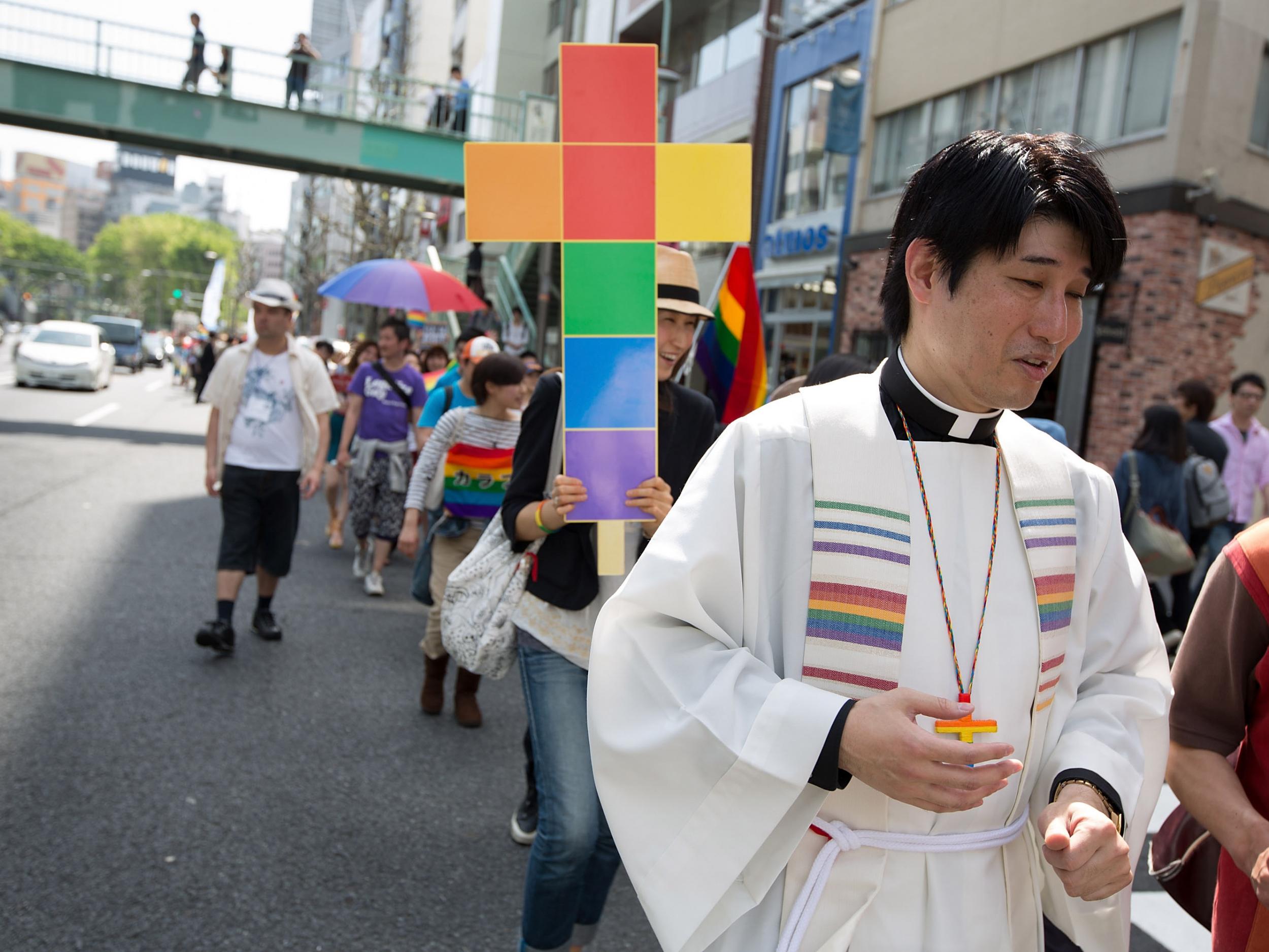 Members of the ‘United Church of Christ in Japan’ take part in Tokyo Rainbow Pride and parade through the streets