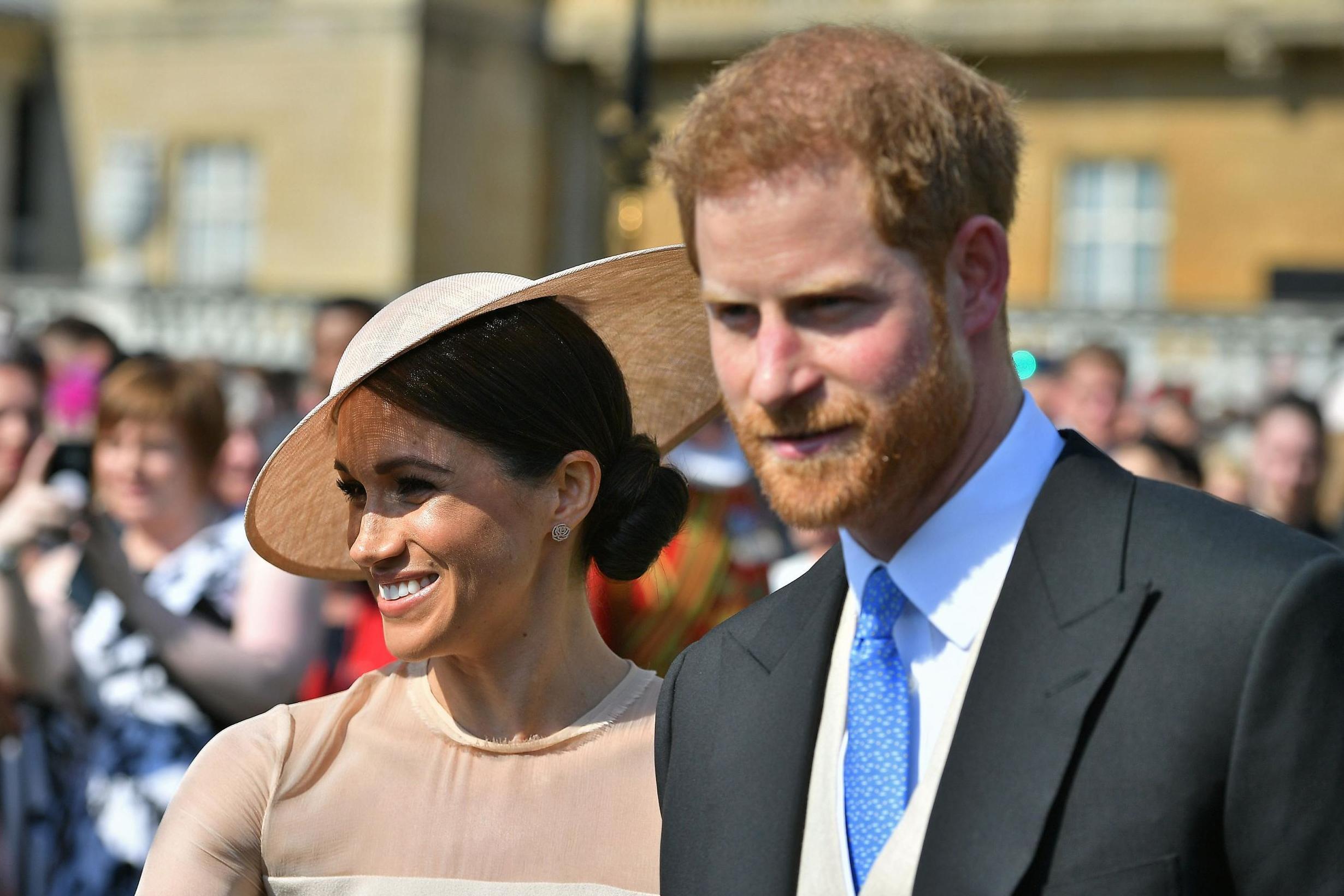 The couple appeared in love as they arrived for Prince Charles' birthday party (Getty)