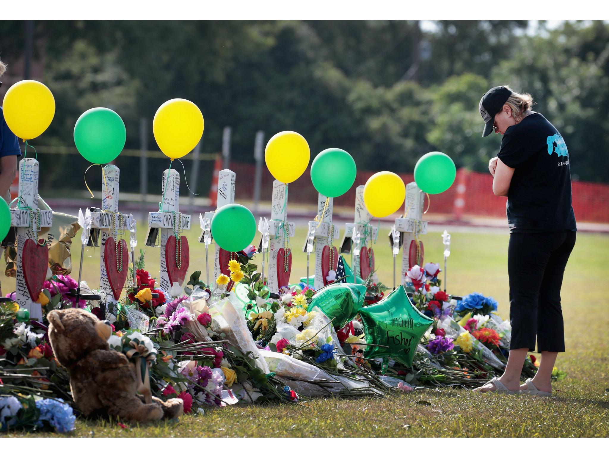 A memorial for the dead after the shooting in Santa Fe, Texas last week