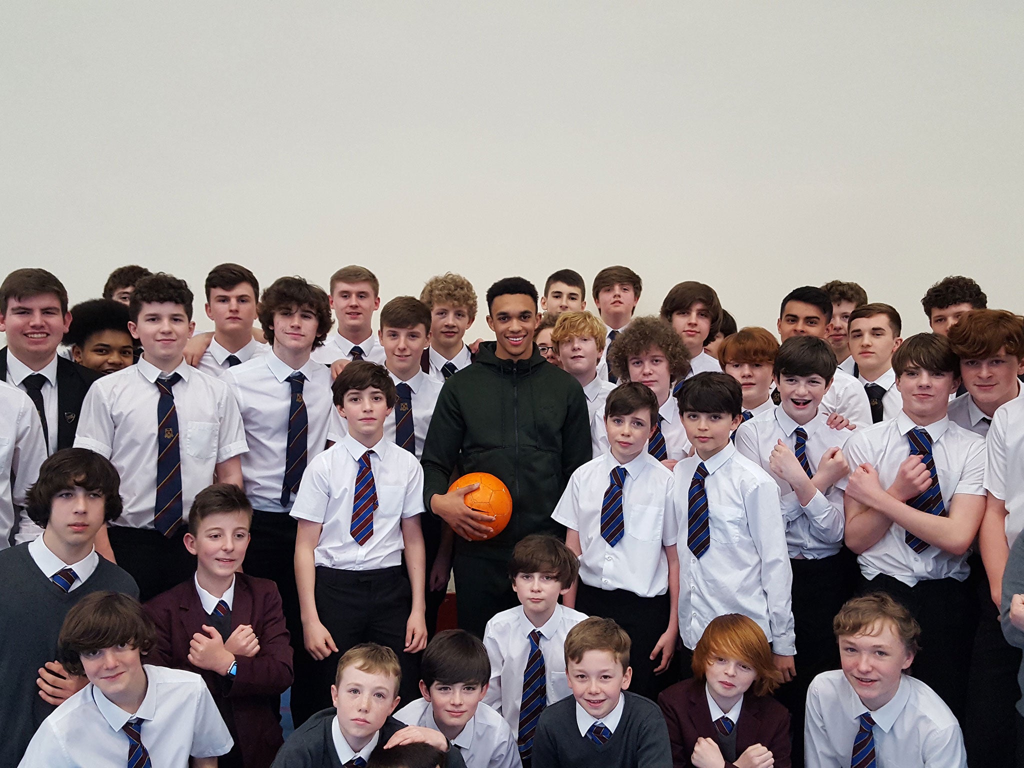 Alexander-Arnold with current students of St Mary's school