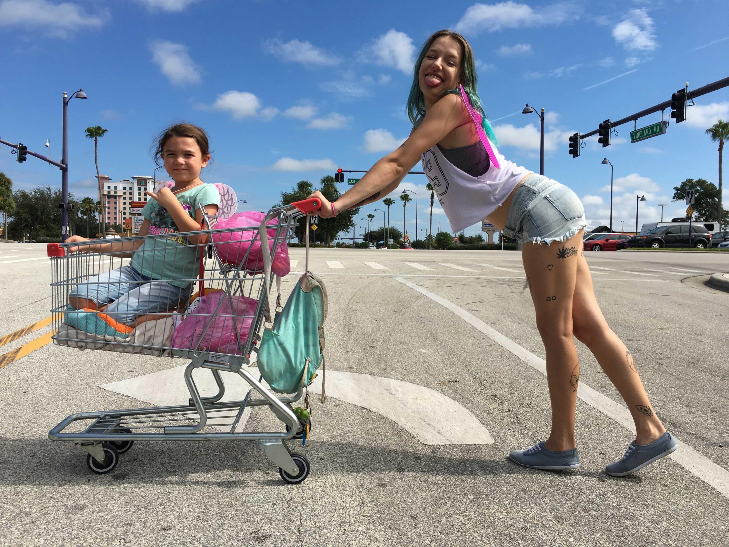 Moonee (Brooklynn Prince) and Halley (Bria Vinaite) in The Florida Project, directed by Sean Baker