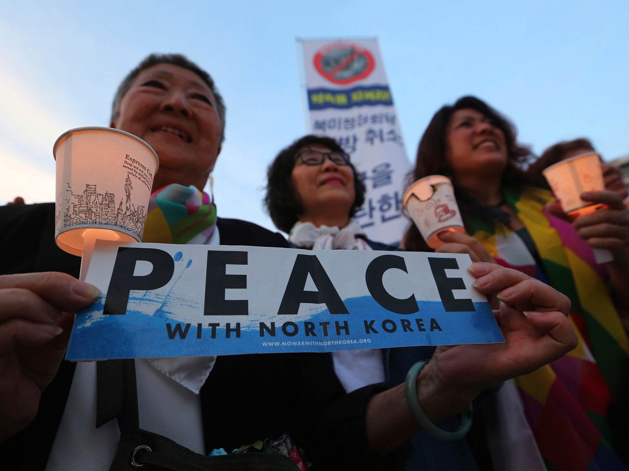 Protesters denounce the latest US move near the US embassy in Seoul on Friday