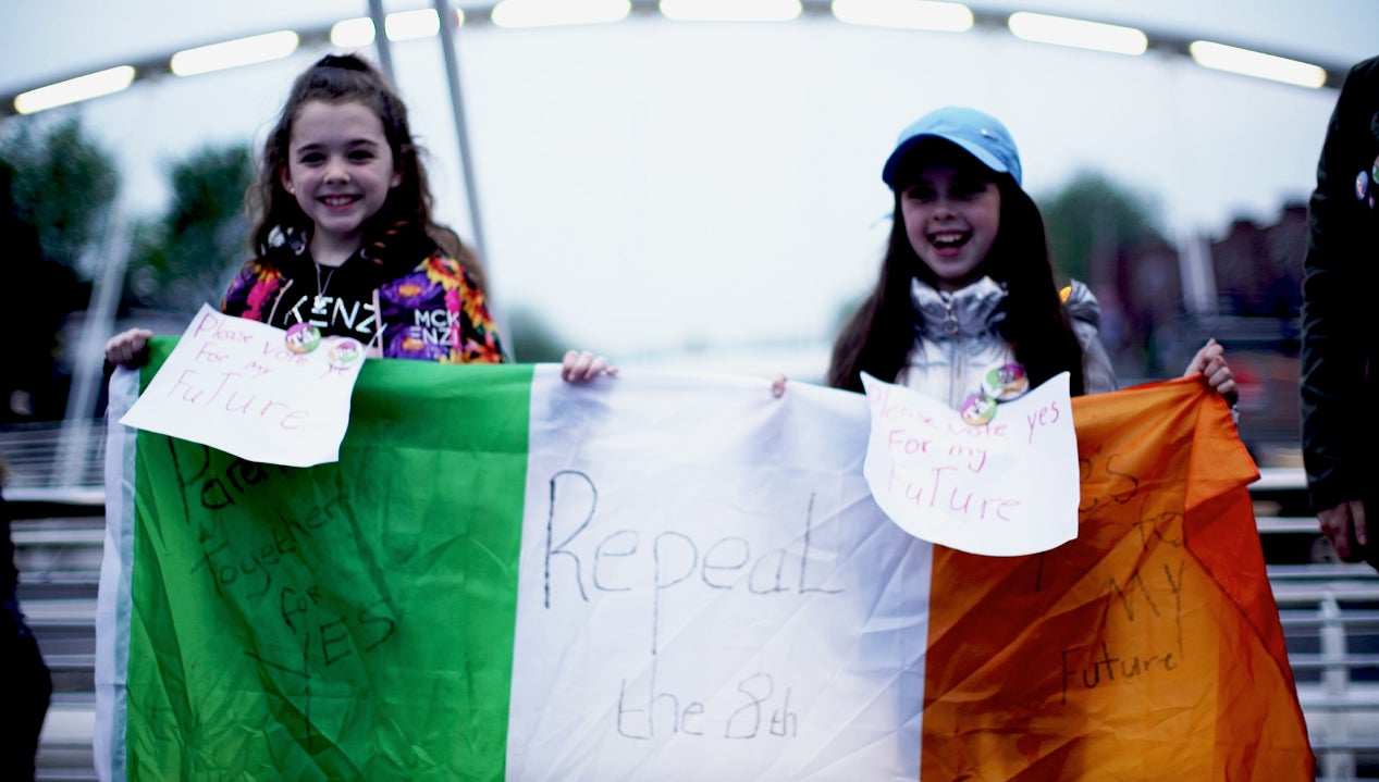 Young campaigners celebrate exit poll suggesting victory for campaign to legalise abortion in Ireland