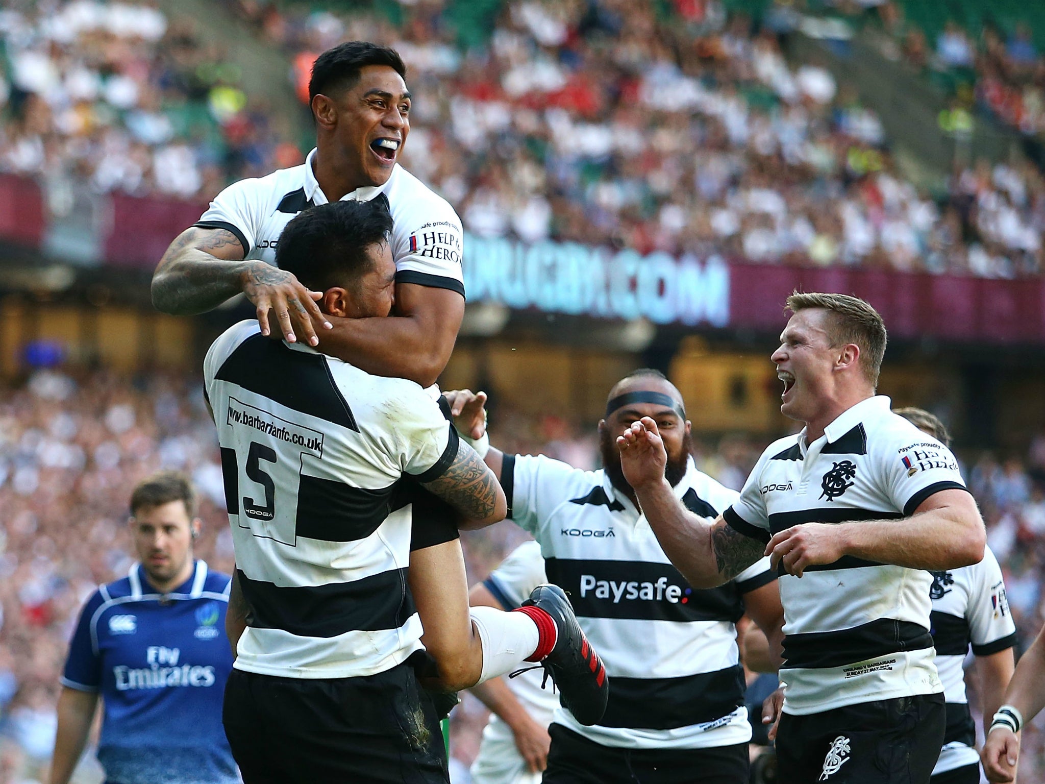 Malakai Fekitoa celebrates with Sitaleki Timane after scoring the Barbarians' eighth try