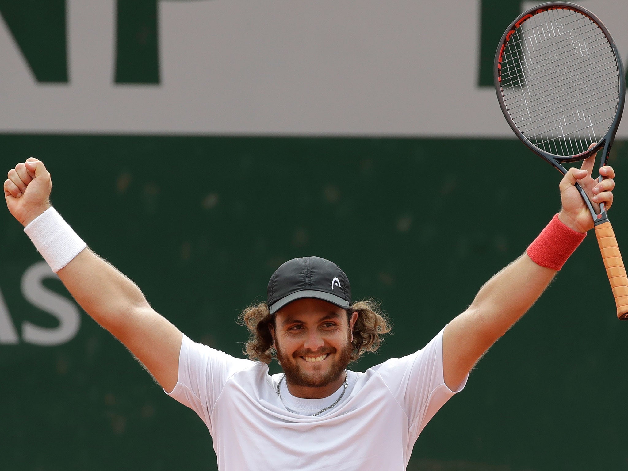 Marco Trungelliti celebrates his victory over Bernard Tomic