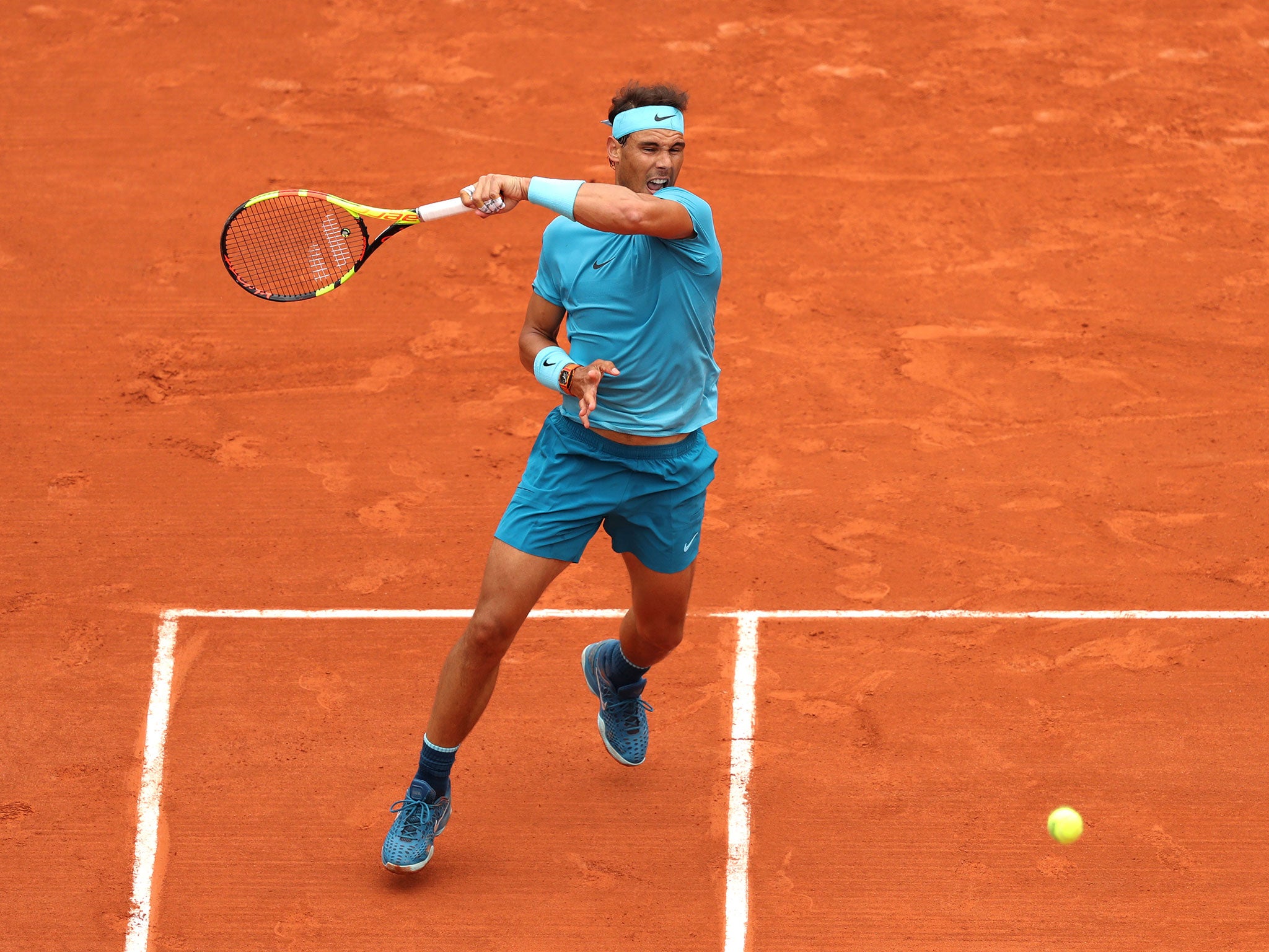 Nadal progressed after resuming on Tuesday