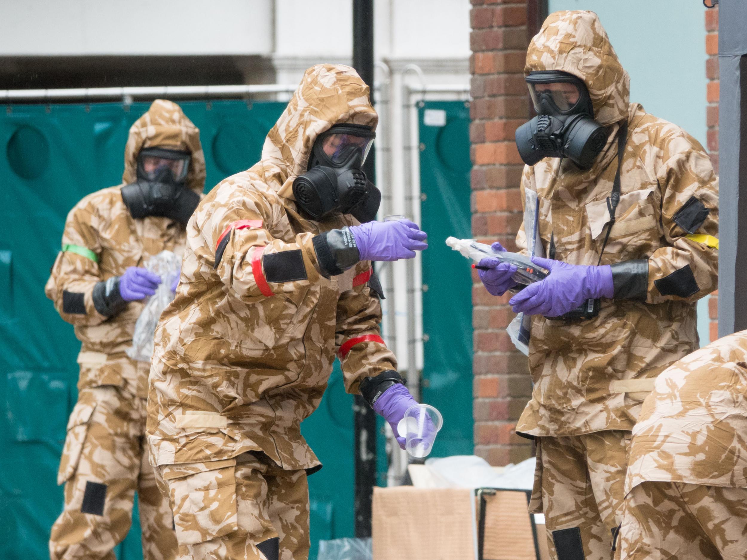 Members of the military work in the Maltings shopping area, close to the bench where Russian former double agent Sergei Skripal and his daughter Yulia were found collapsed