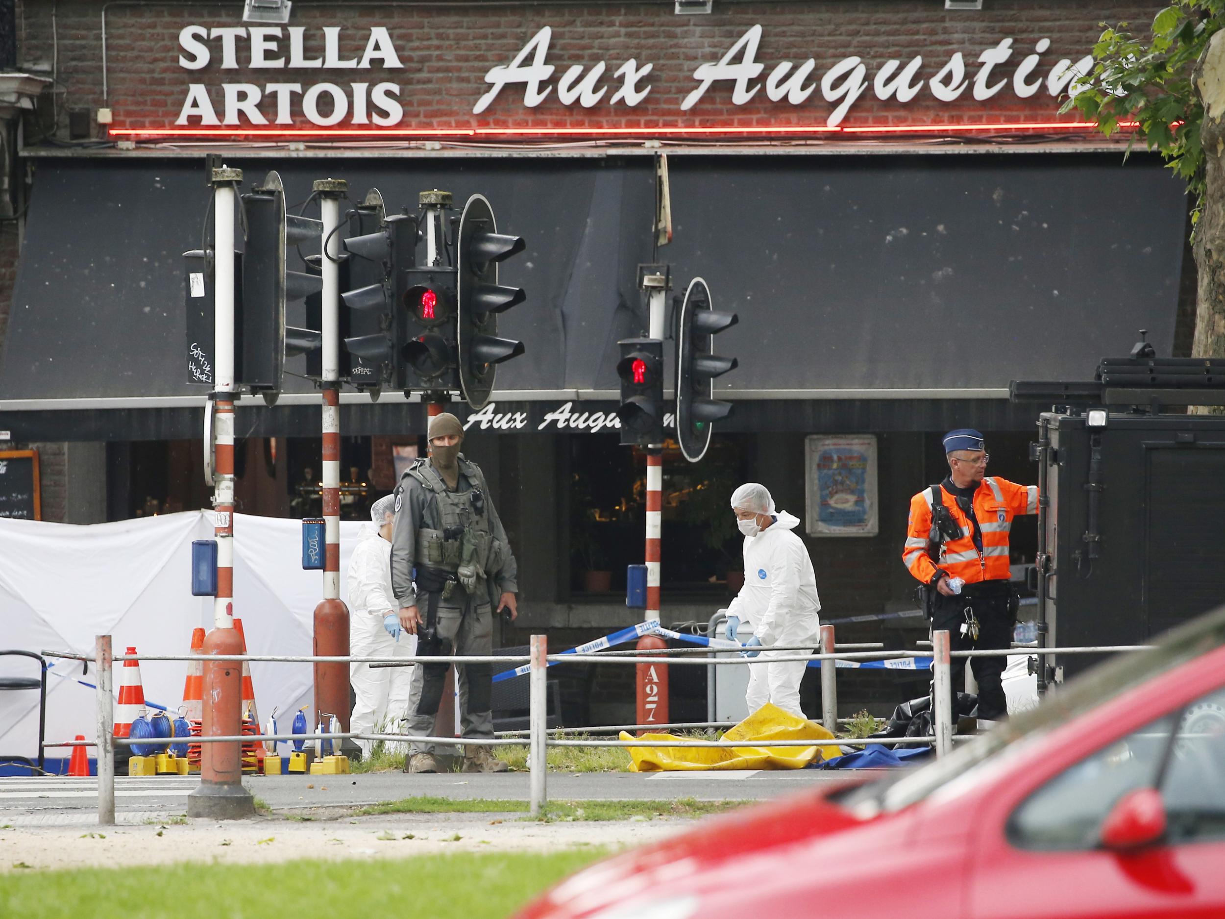 Police at the scene of the shootings in Liege