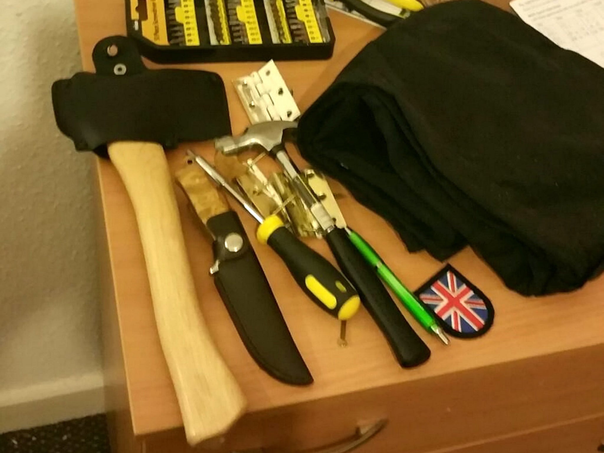 Police found a cache of weapons including an axe and a machete at Stables’ flat (SWNS)