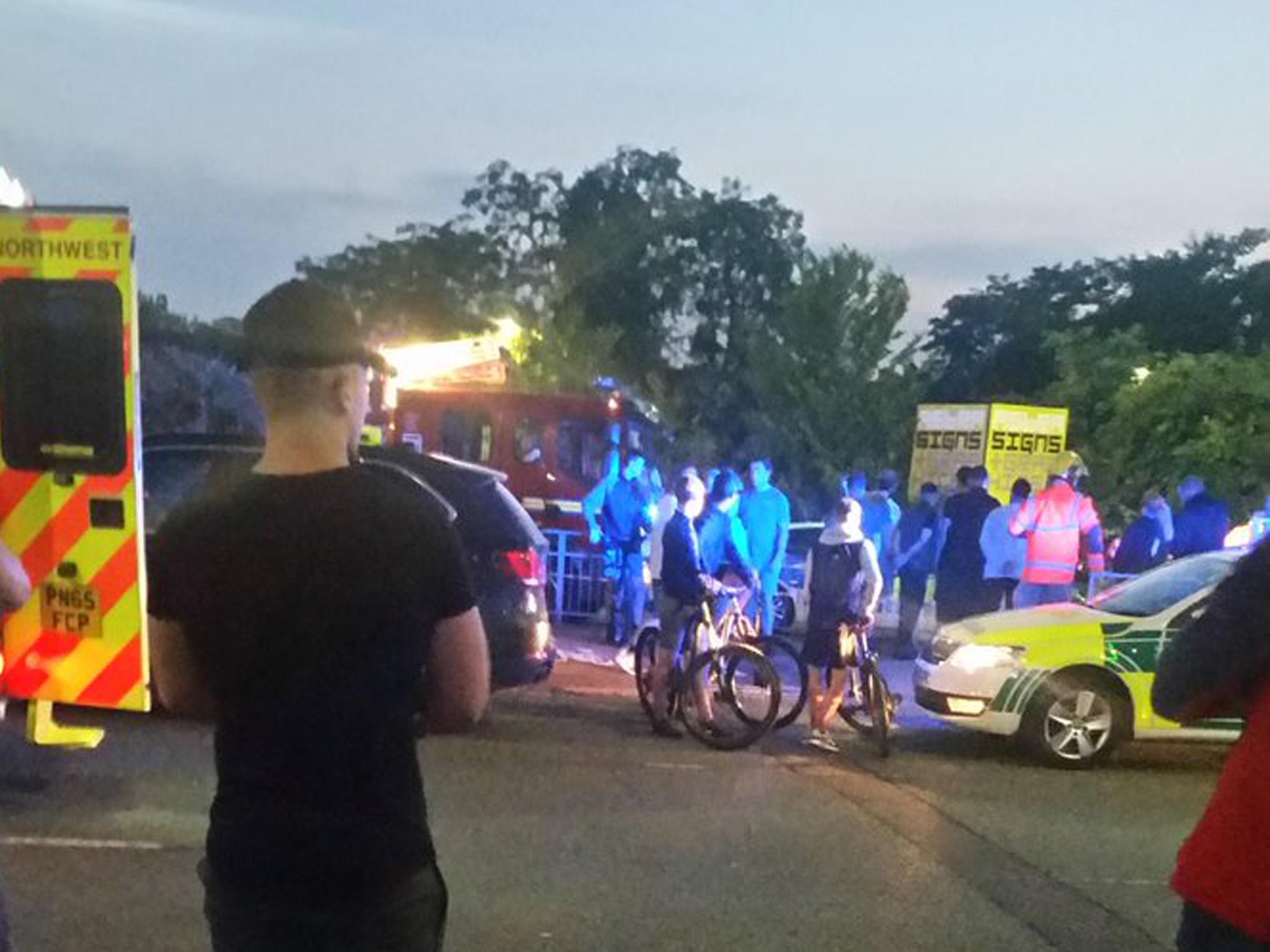 Emergency services at the scene of the hit-and-run in Trafford Park on Thursday night