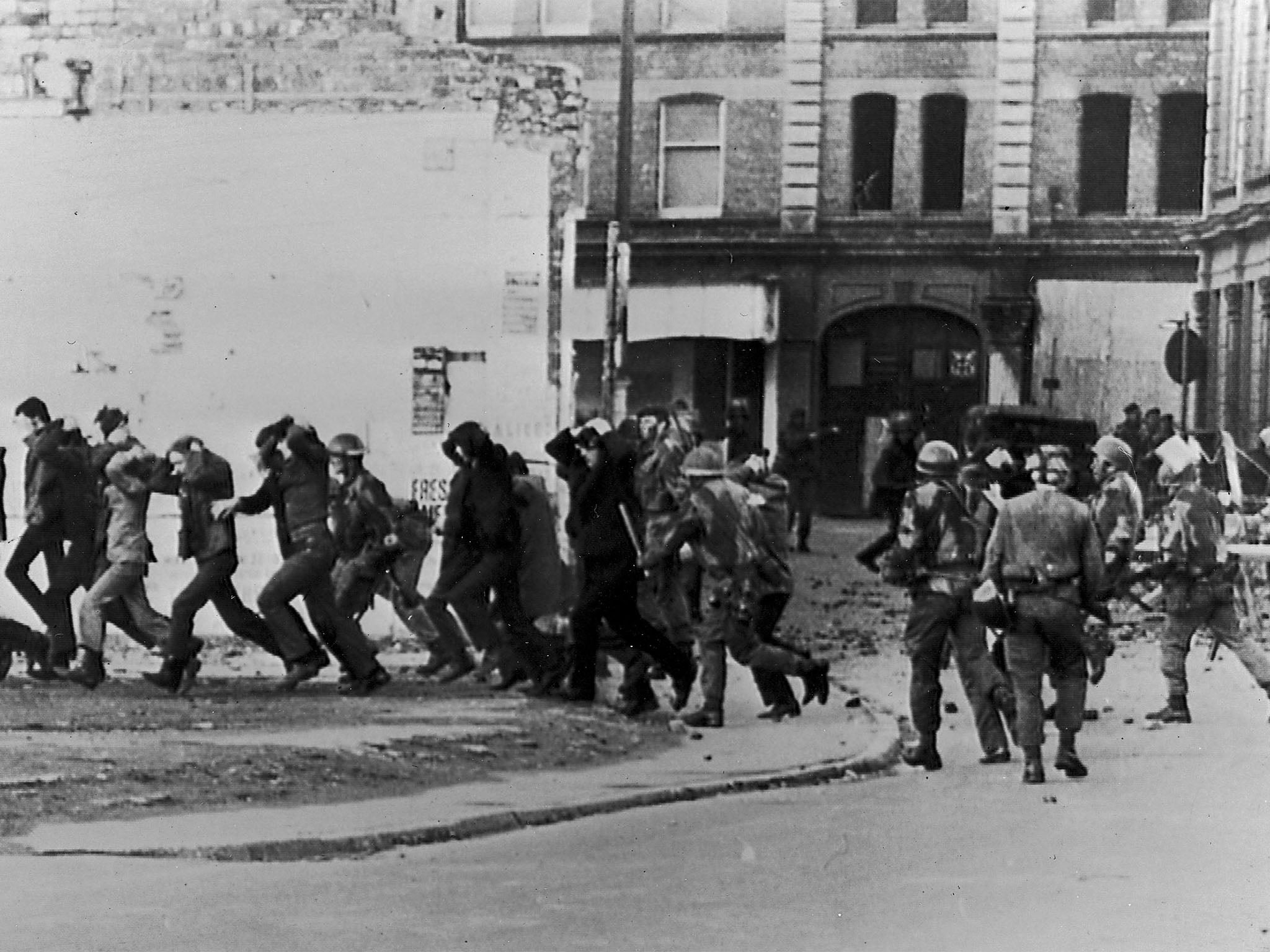 Derry: British paratroopers round up demonstrators on Bloody Sunday, 30 January 1972. Paratroopers opened fire on the civil rights march, killing 14 civilians (Getty)